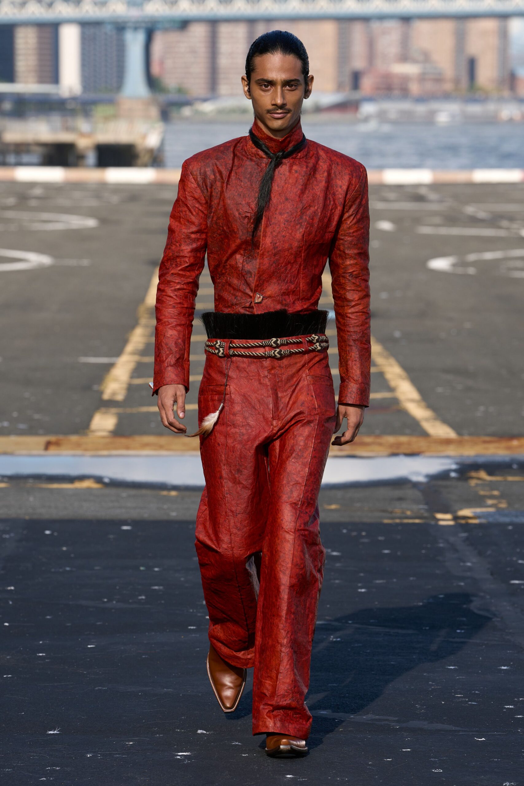 red leather long-sleeve high-neck structured belted panelled jumpsuit