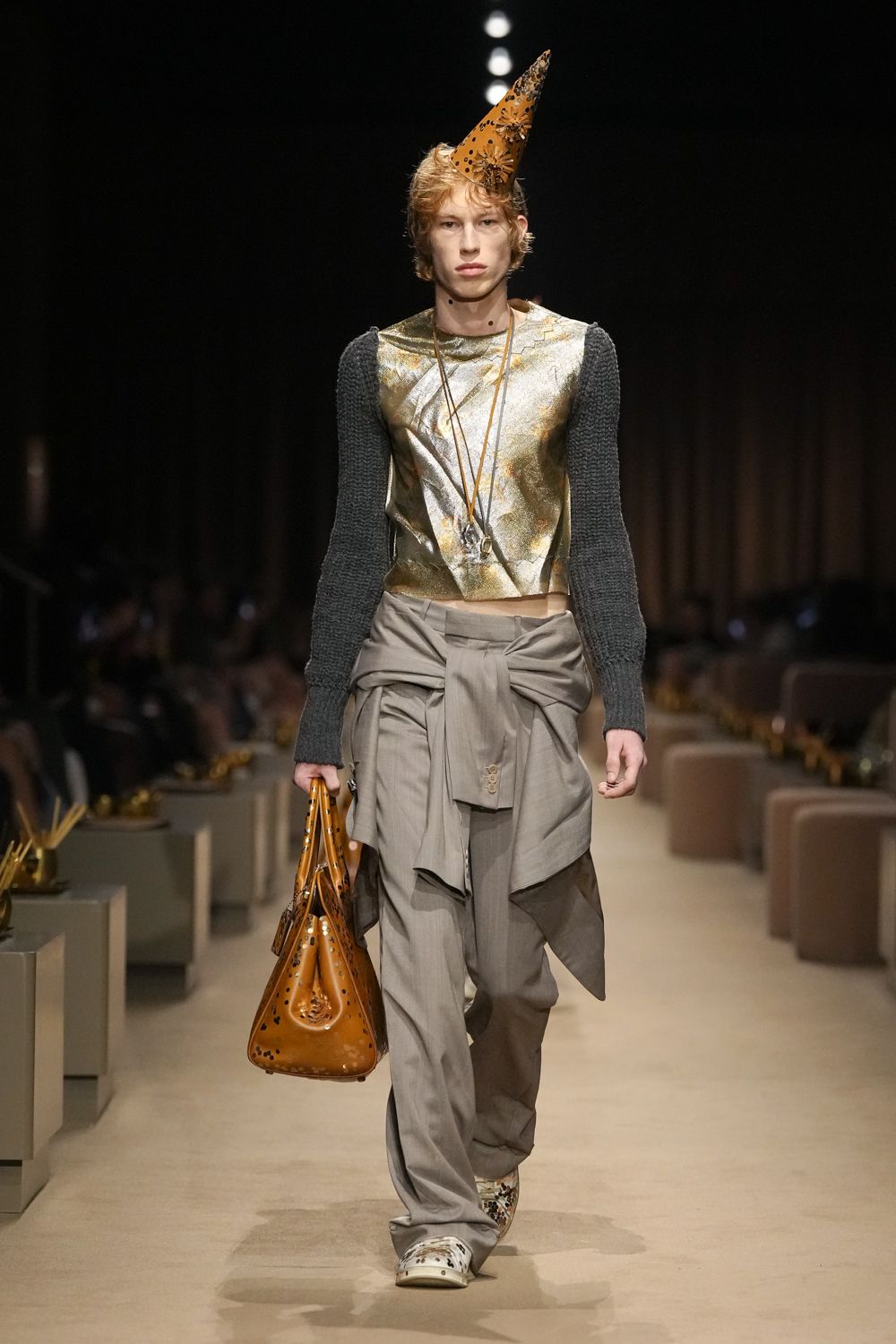 metallic armor-like cropped top