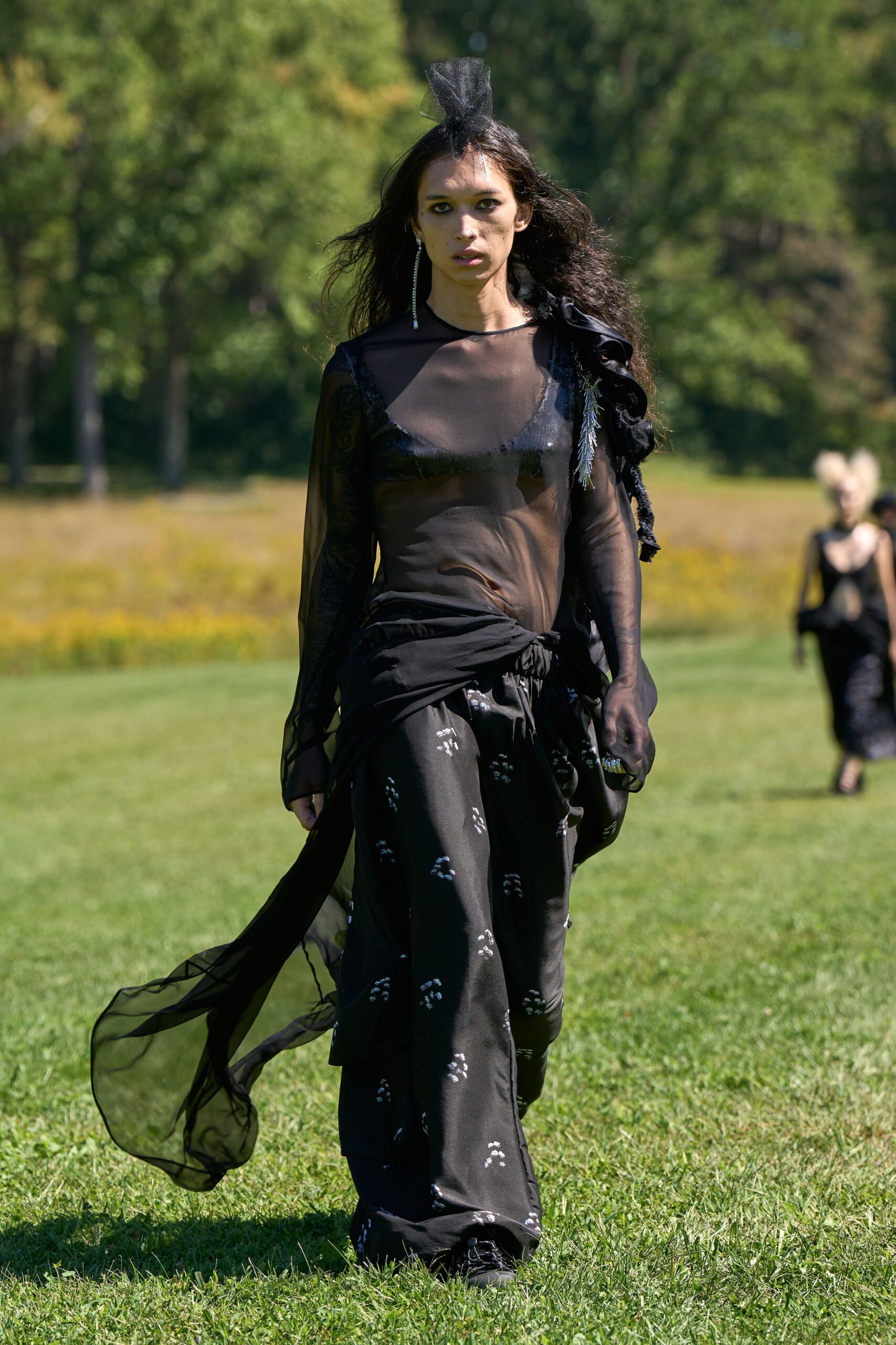 sheer black one-shoulder draped gown