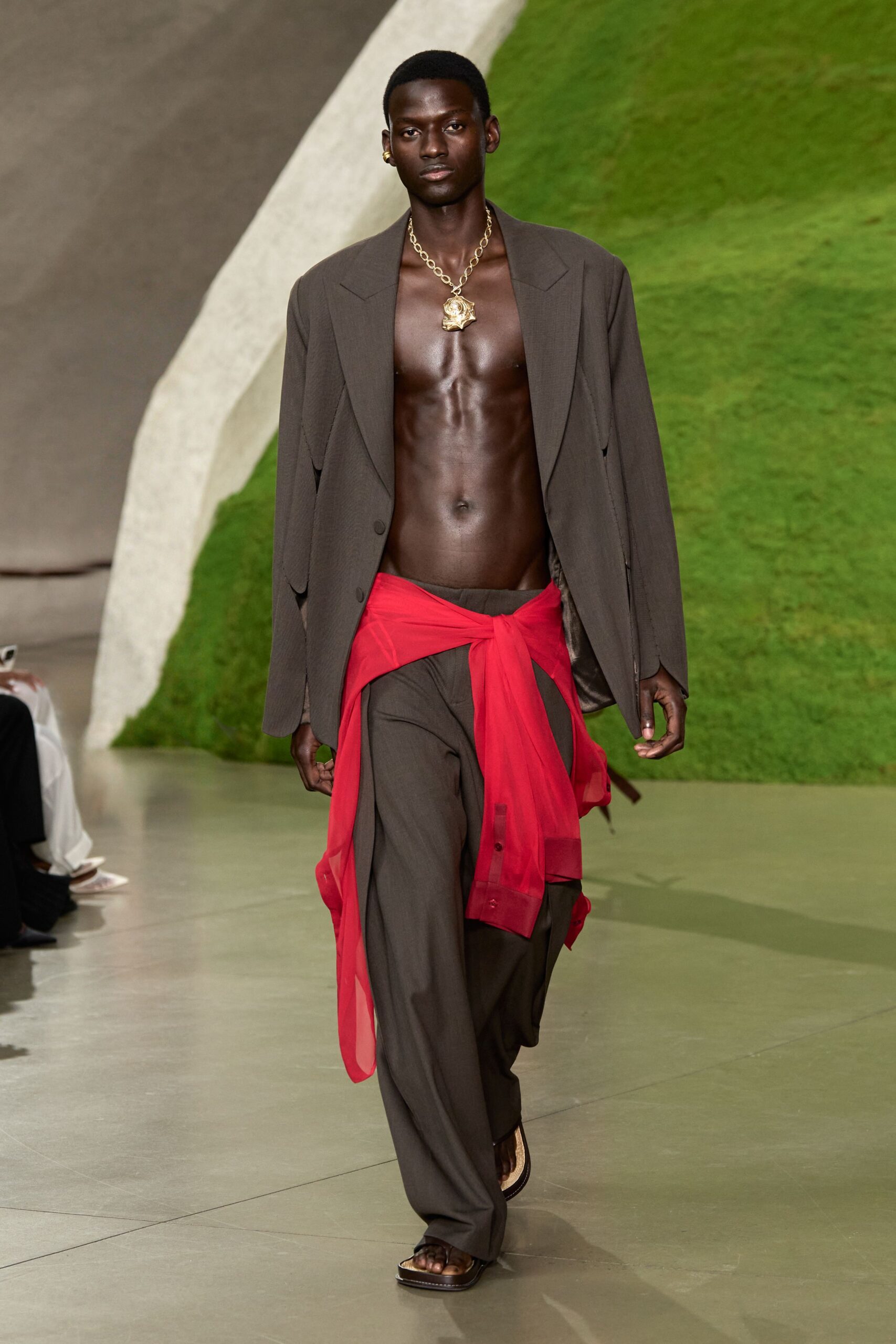 oversized brown blazer with red waist-tied shirt