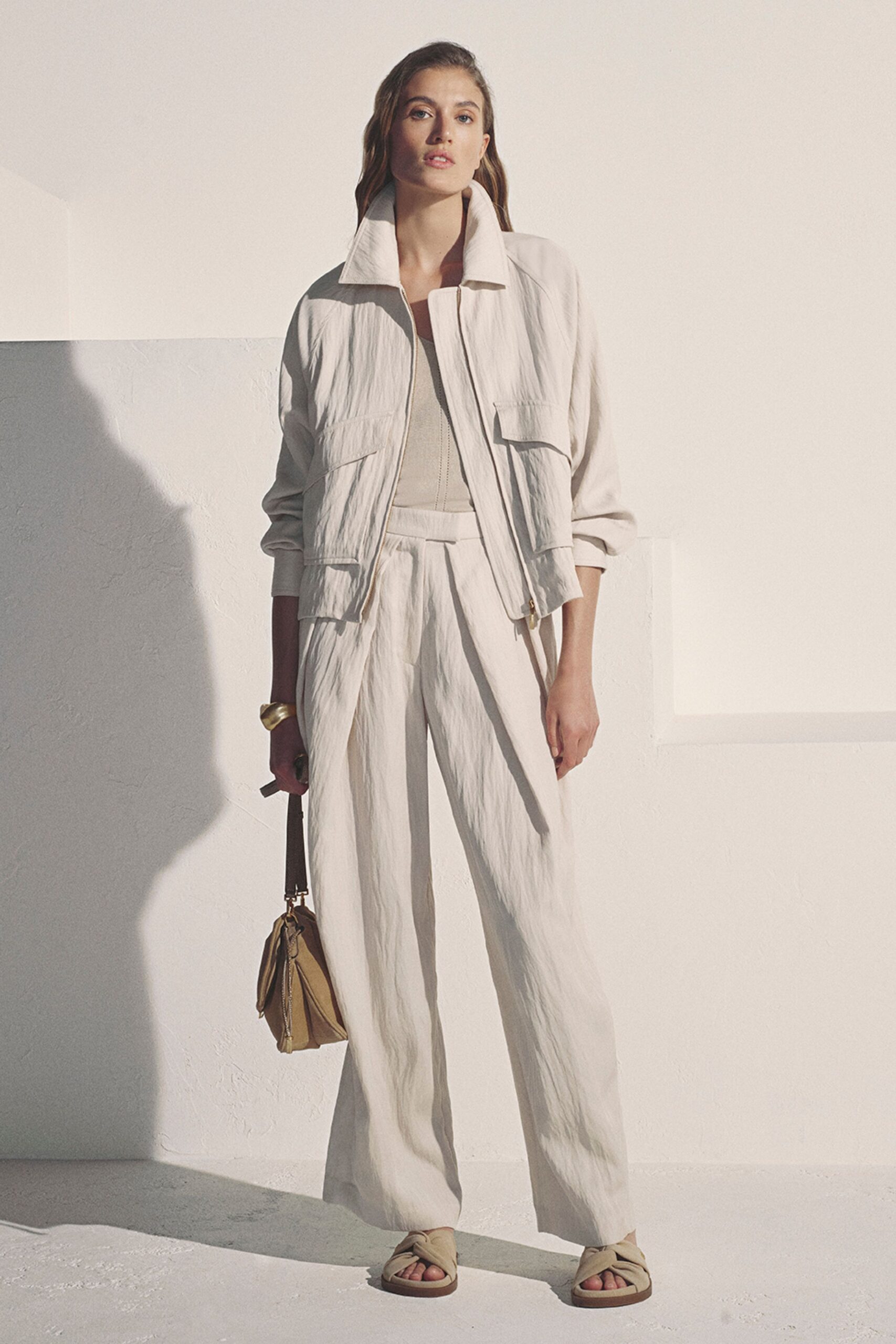 ivory utility jacket and wide-leg trousers