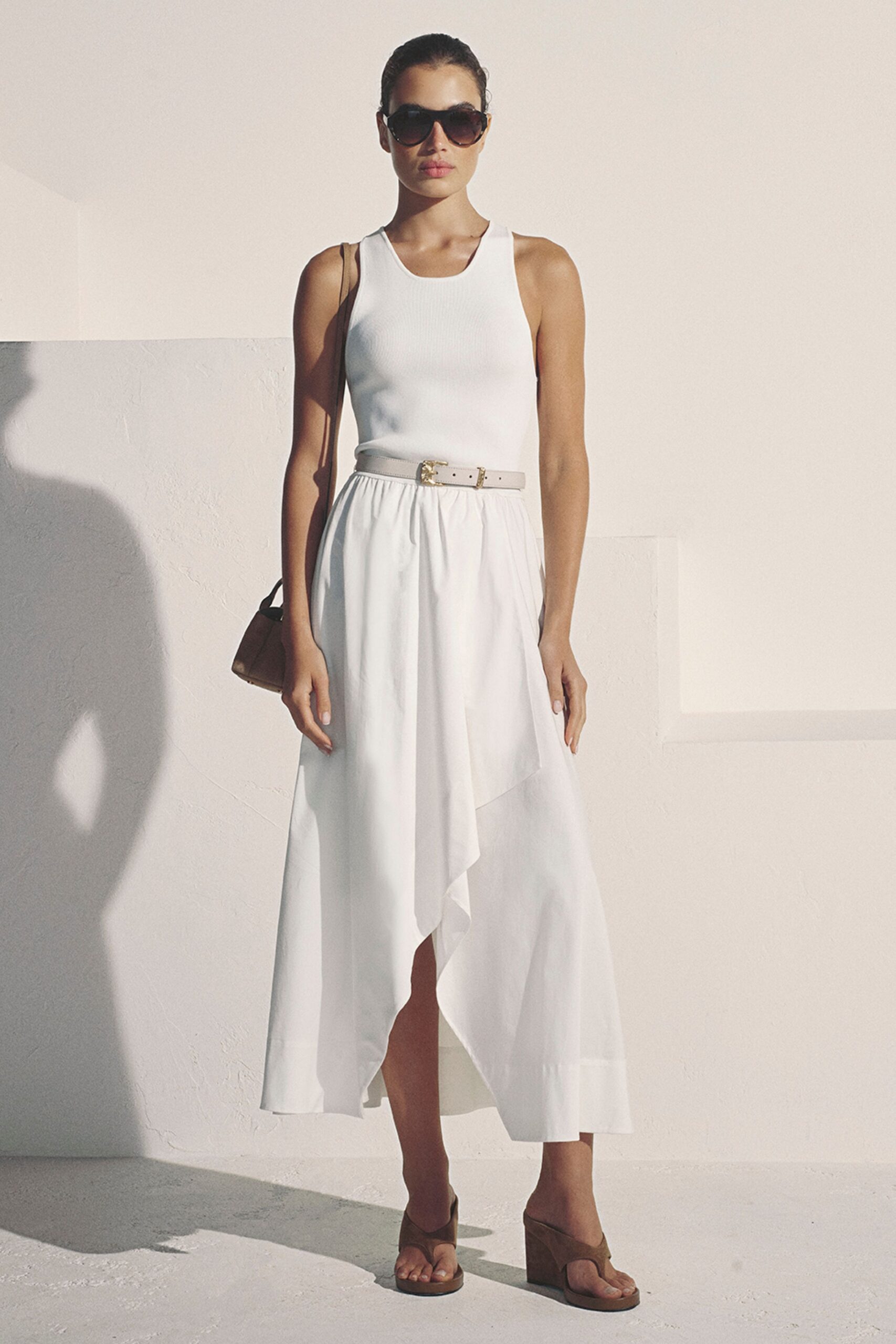 white knit sleeveless scoop-neck belted draped flowing dress