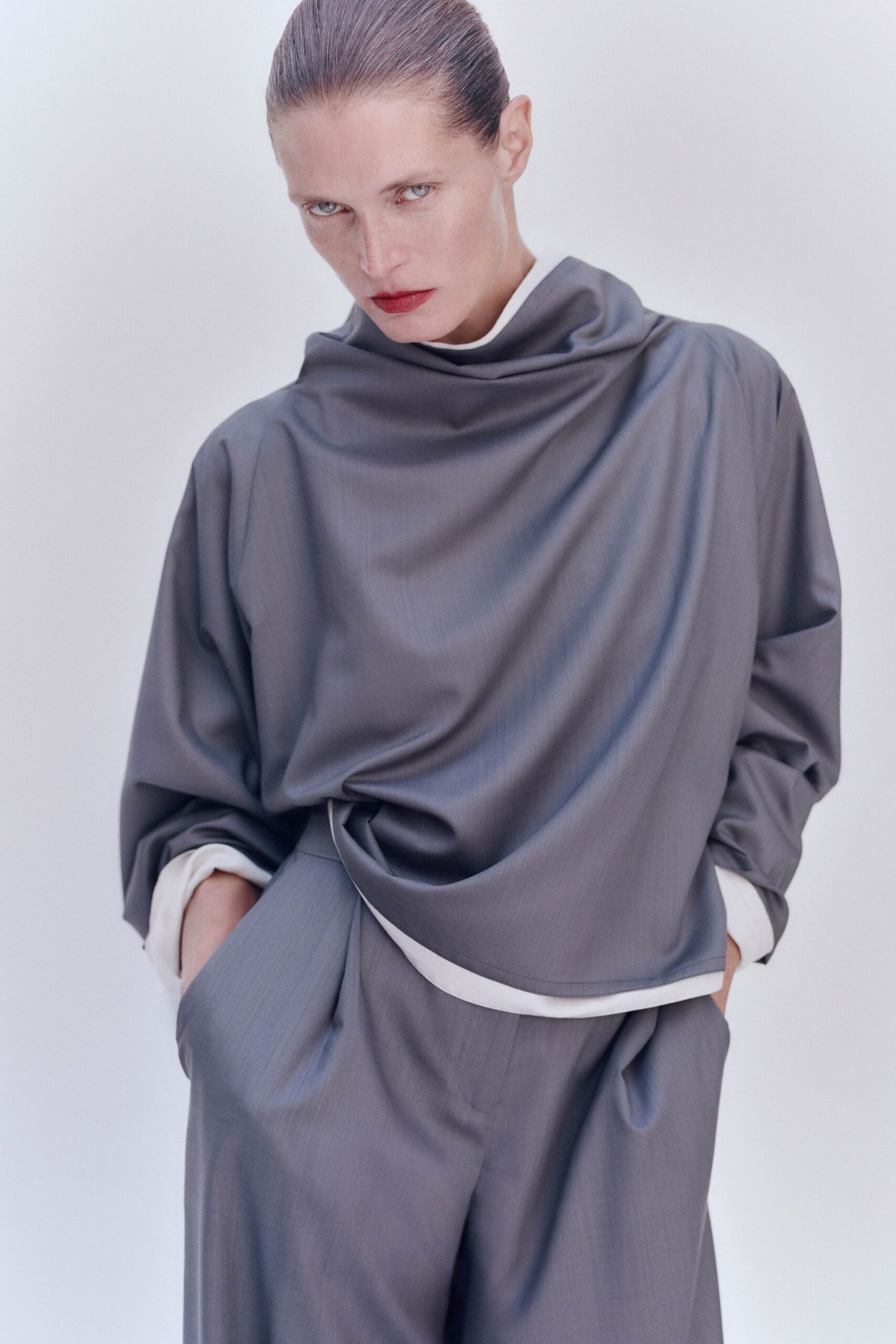 gray draped cowl-neck top