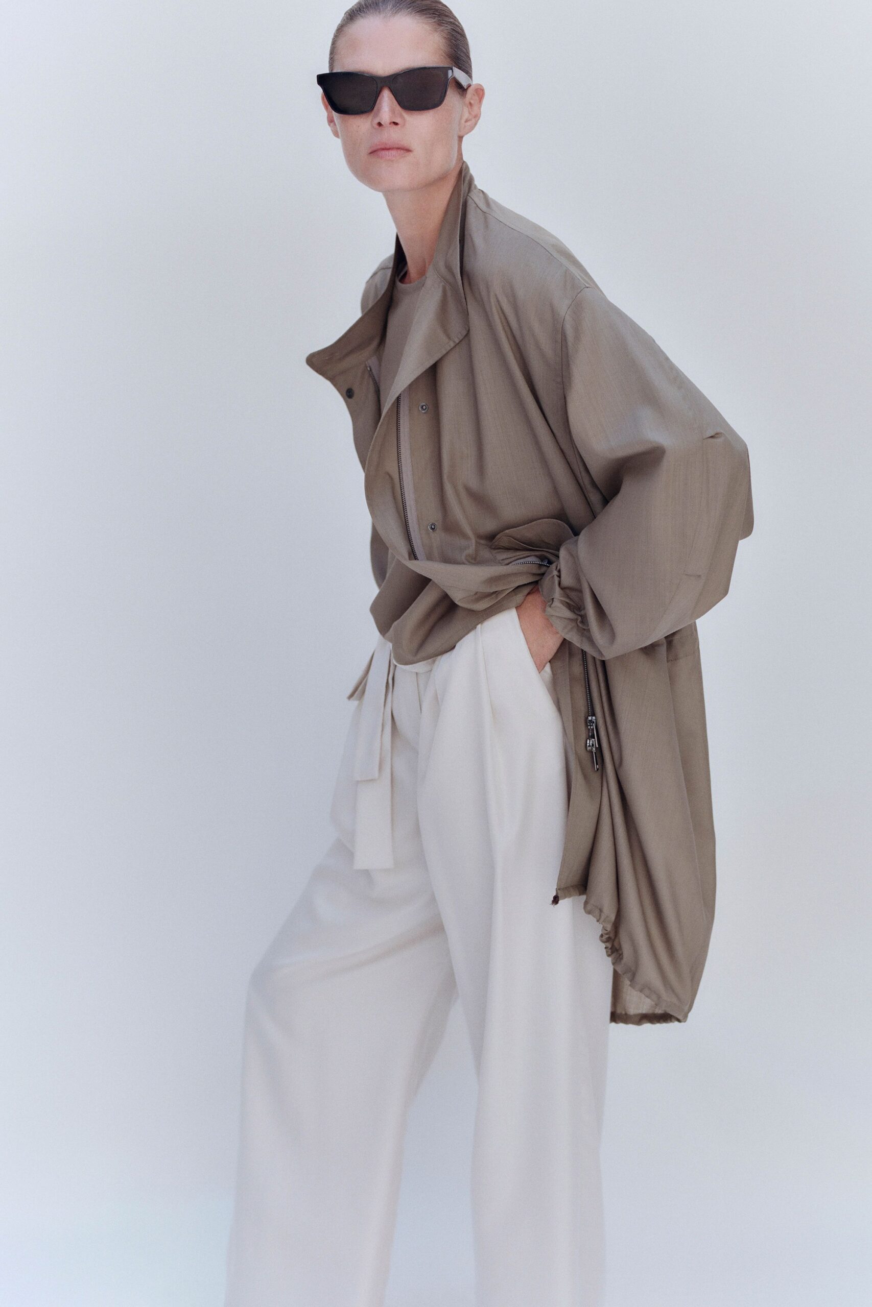 oversized beige draped zip coat