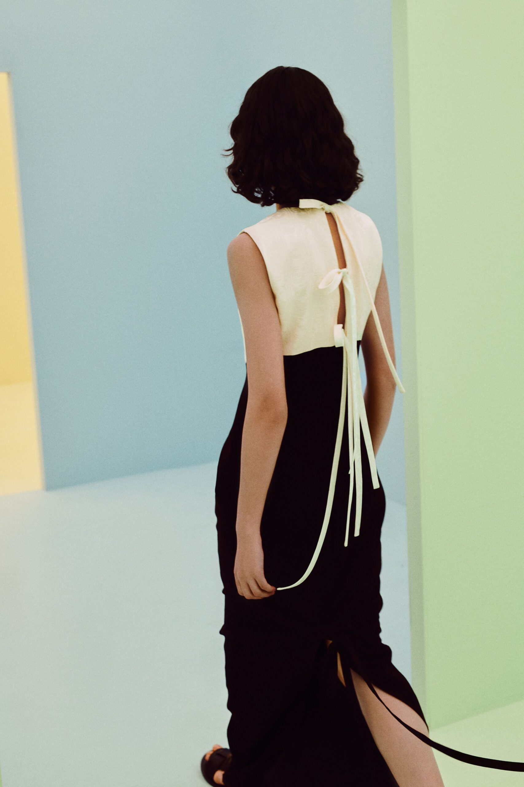 open-back black and ivory evening gown