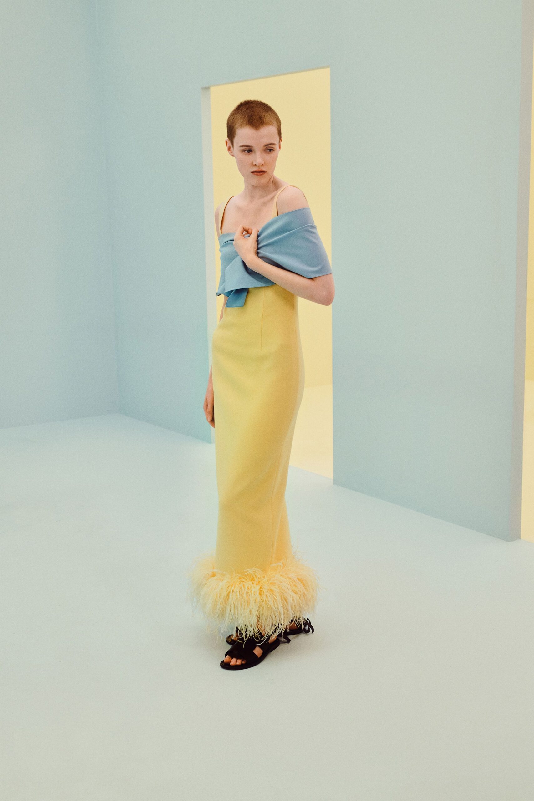 feather-hem yellow column gown
