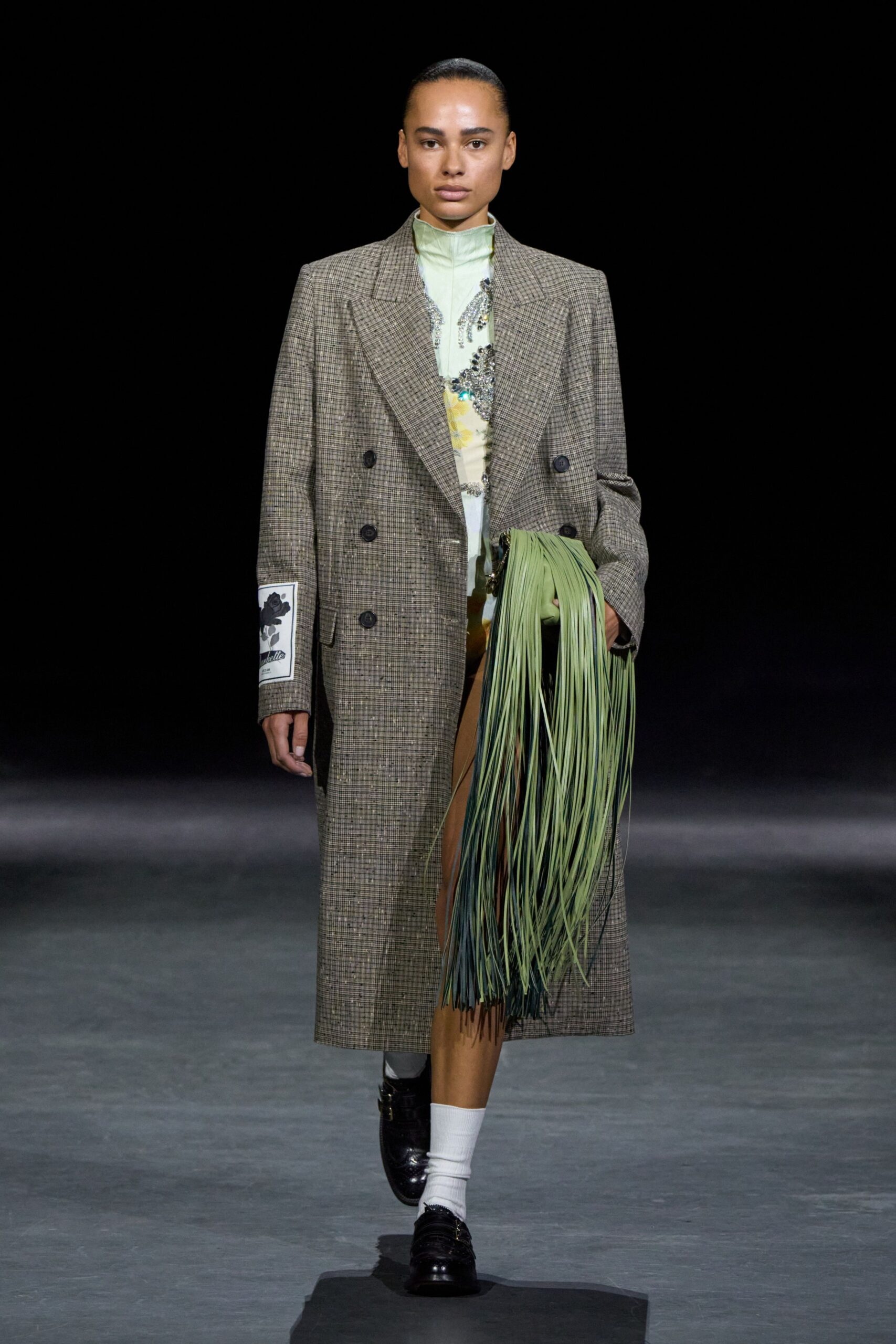 green leather fringed bag