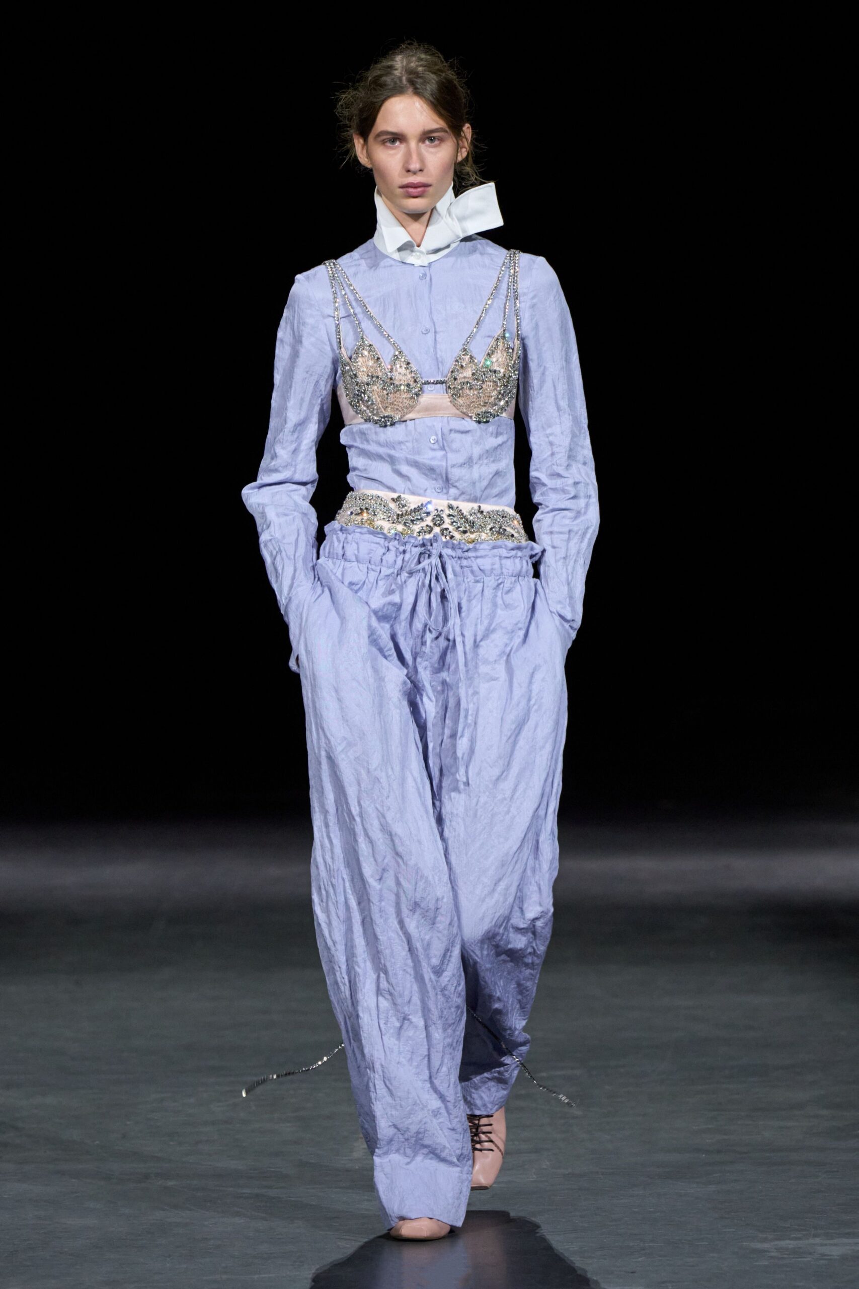 jeweled bra-style bustier over shirt