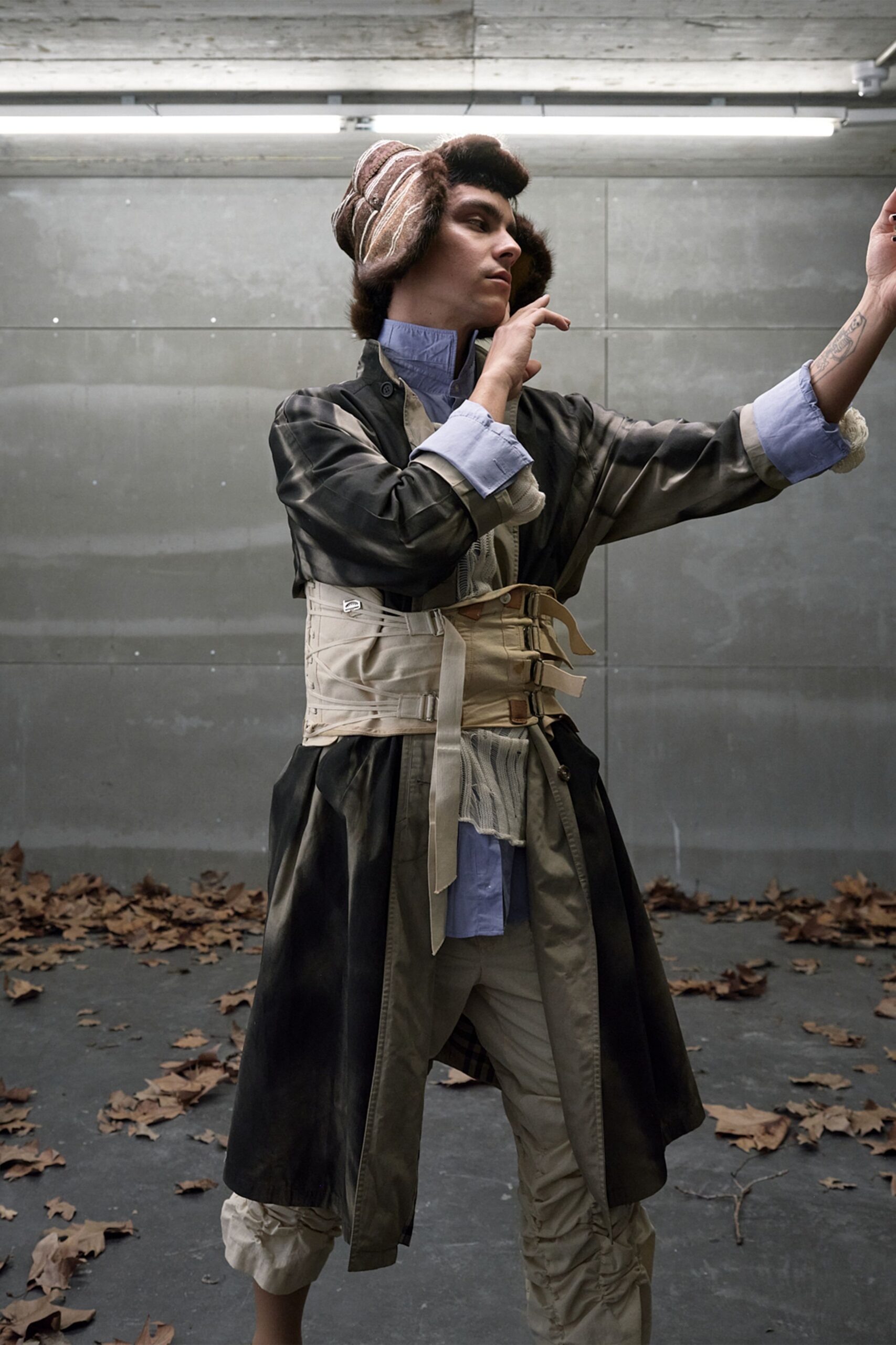 fur earflap hat with leather trench