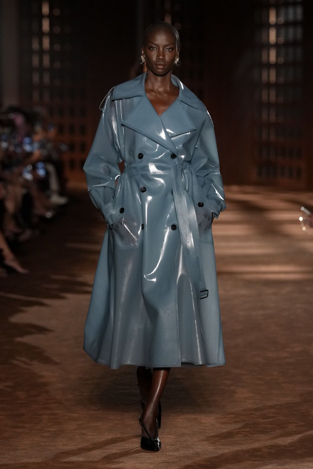 glossy blue vinyl trench coat