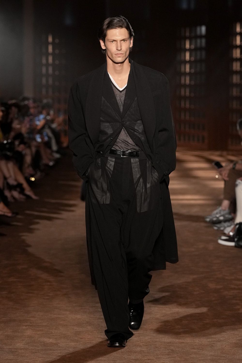 draped black overcoat