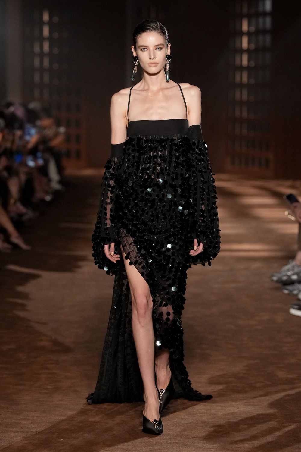 black sequined sheer draped evening gown