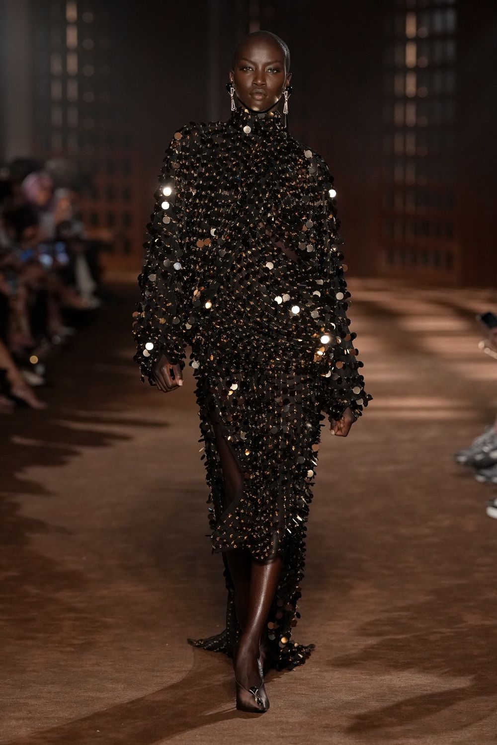 black sequined high-neck evening gown