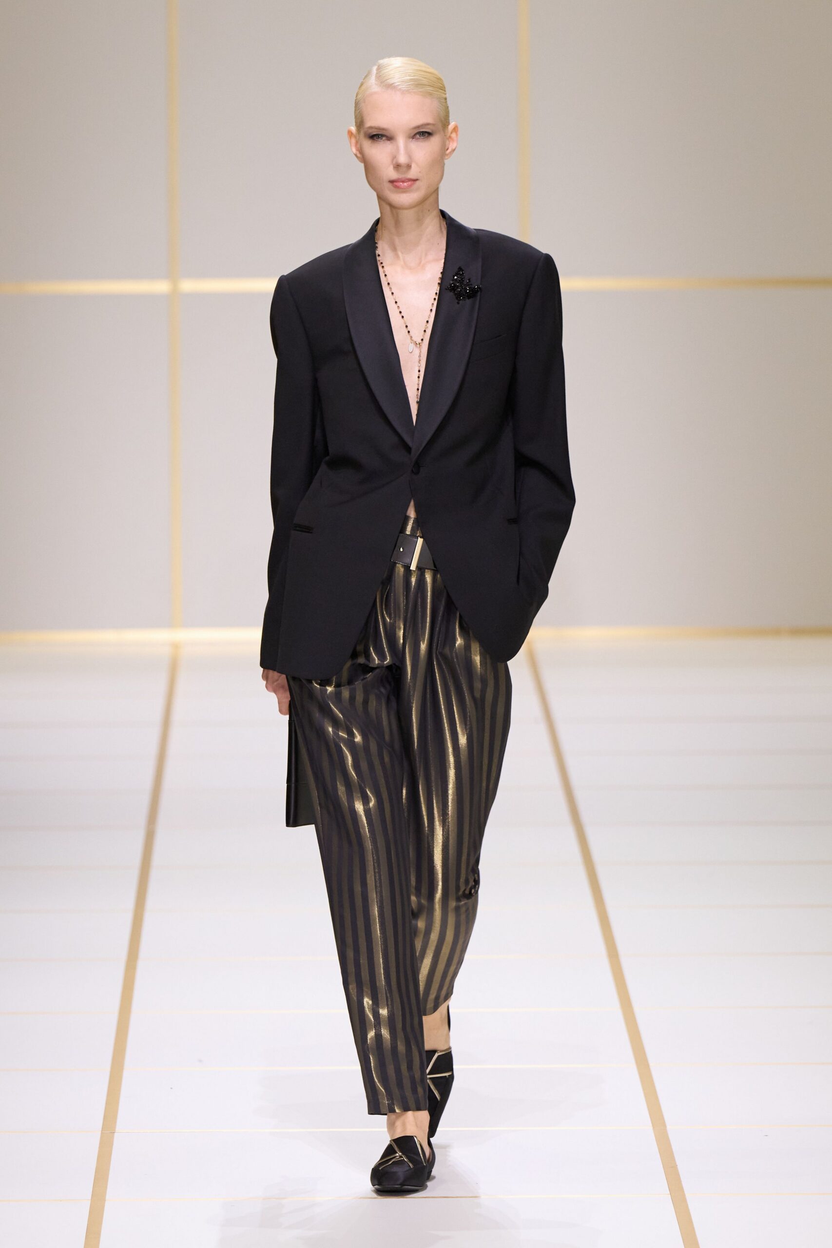 black striped belted shiny pants