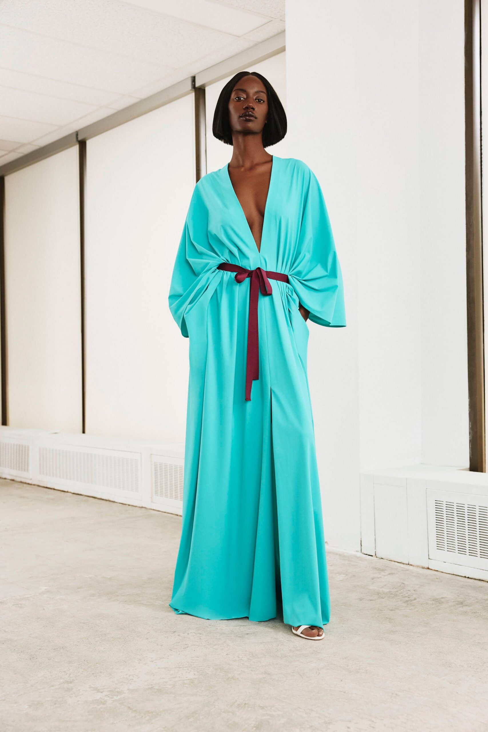 caftan-style belted teal gown