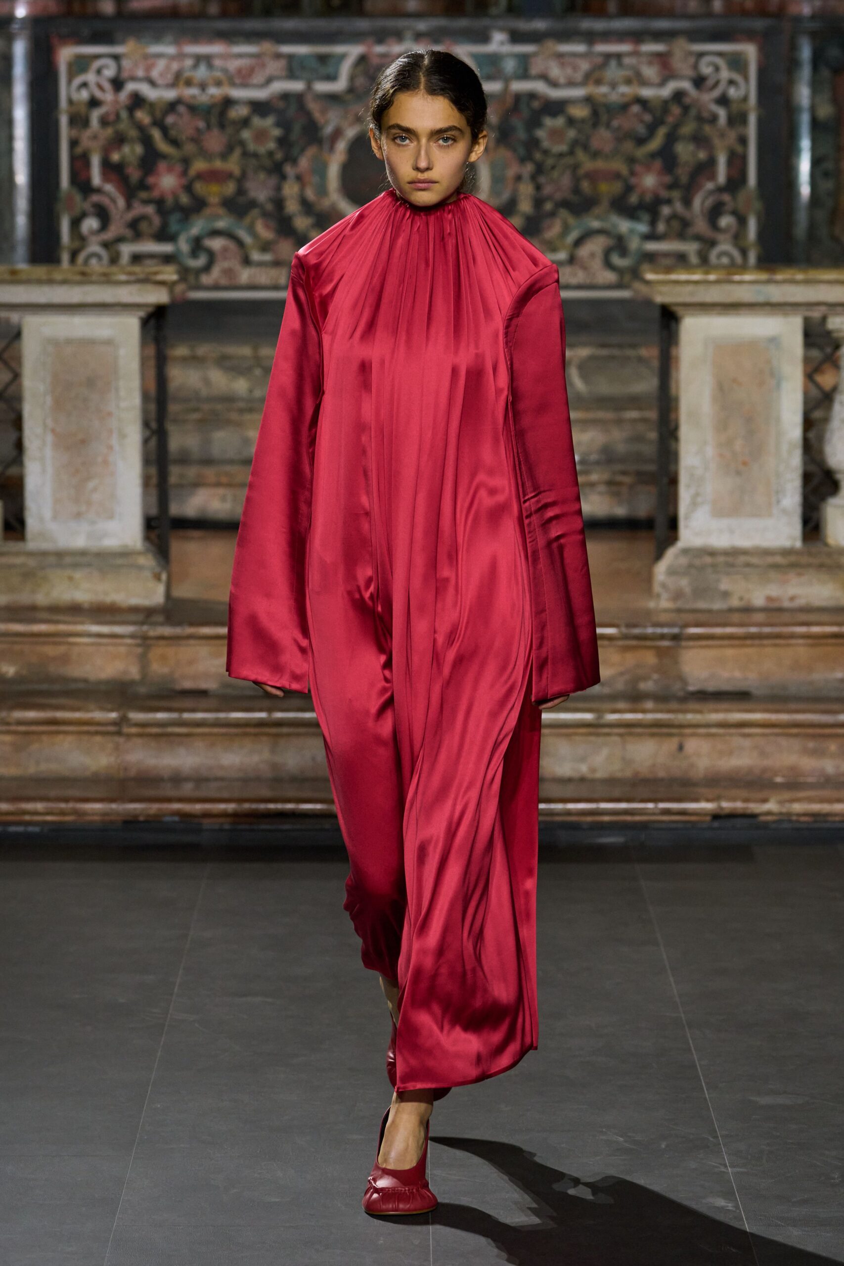 high-neck pleated satin gown