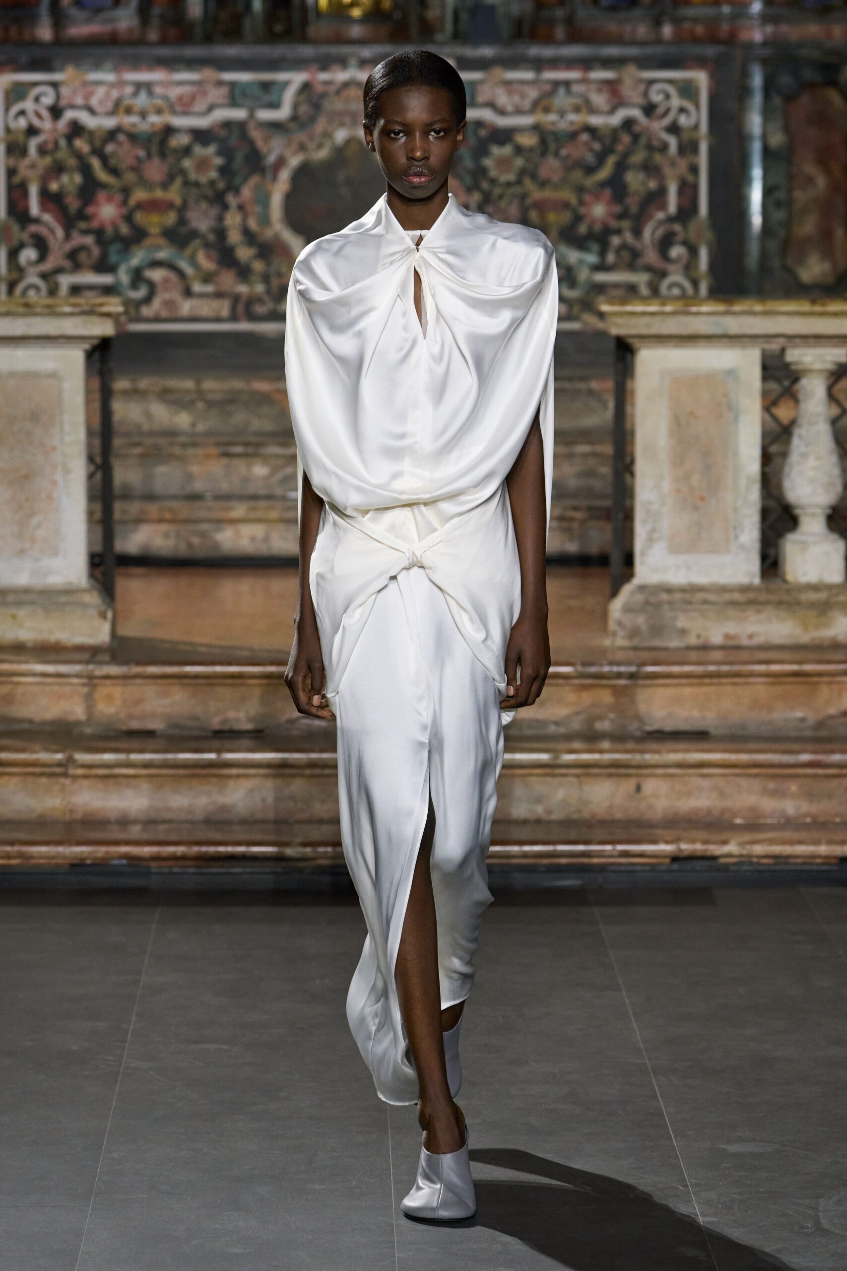 draped white satin evening gown