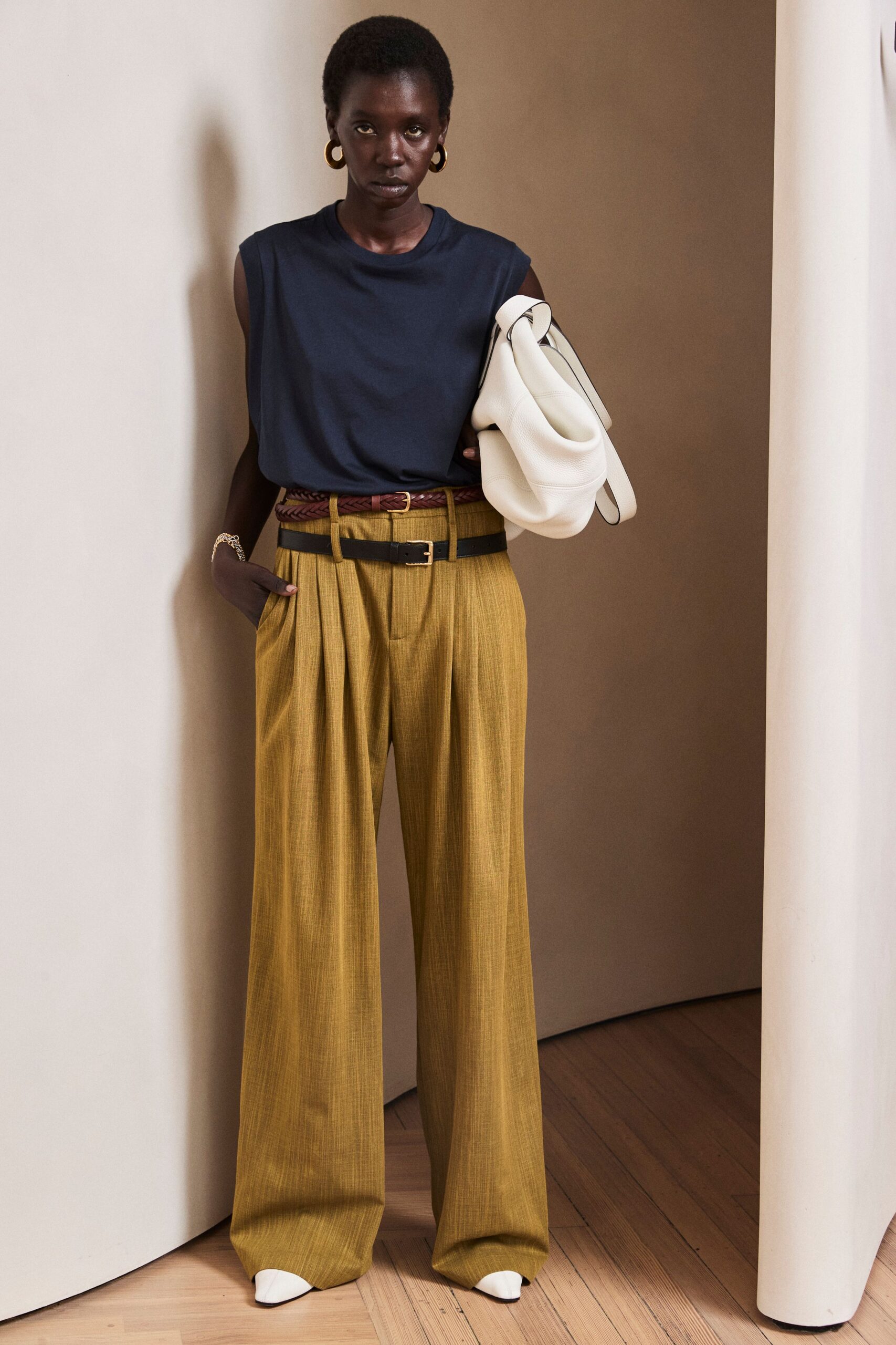 mustard wide-leg pleated trousers