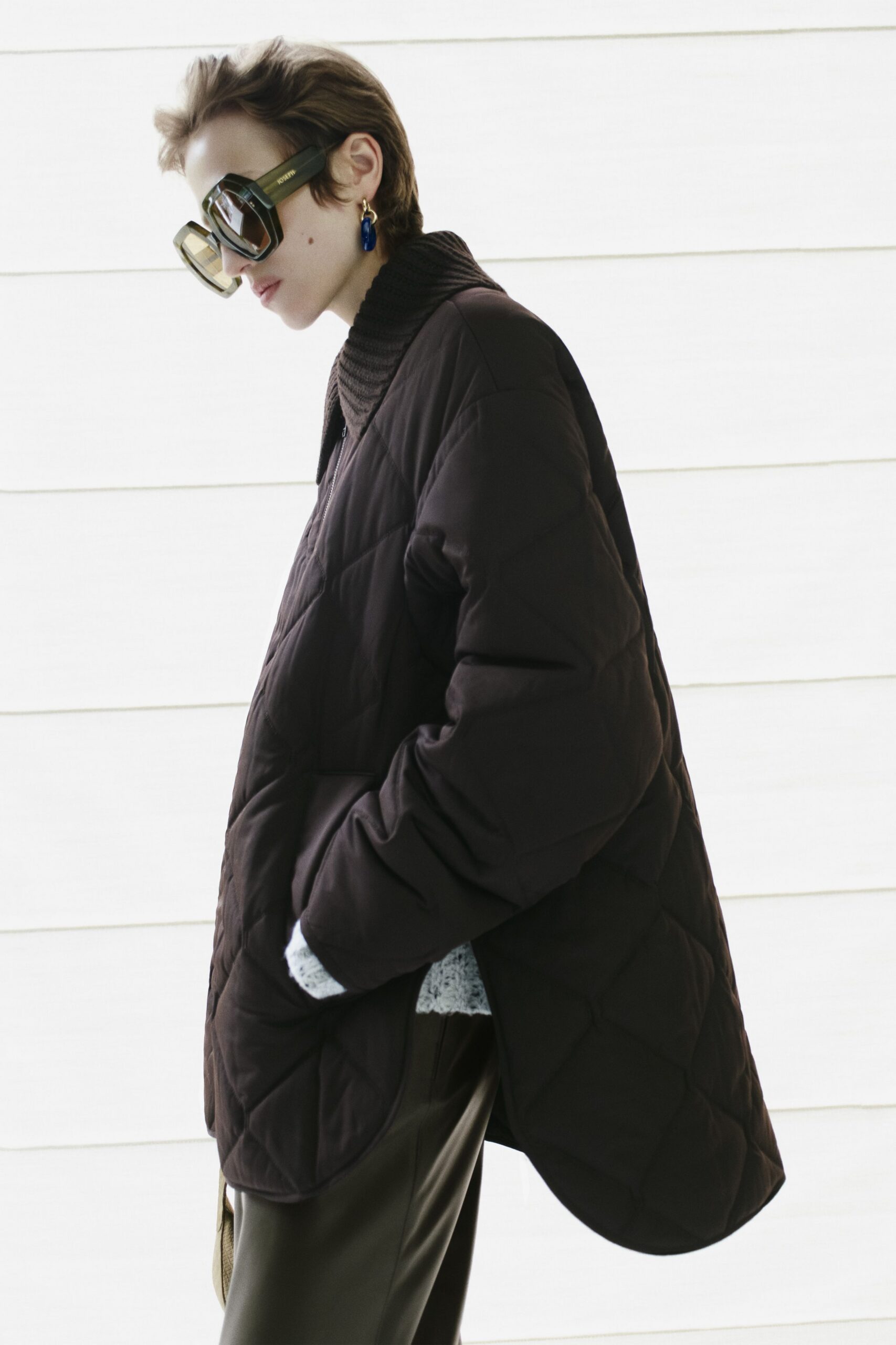 black knit turtleneck ribbed textured sweater