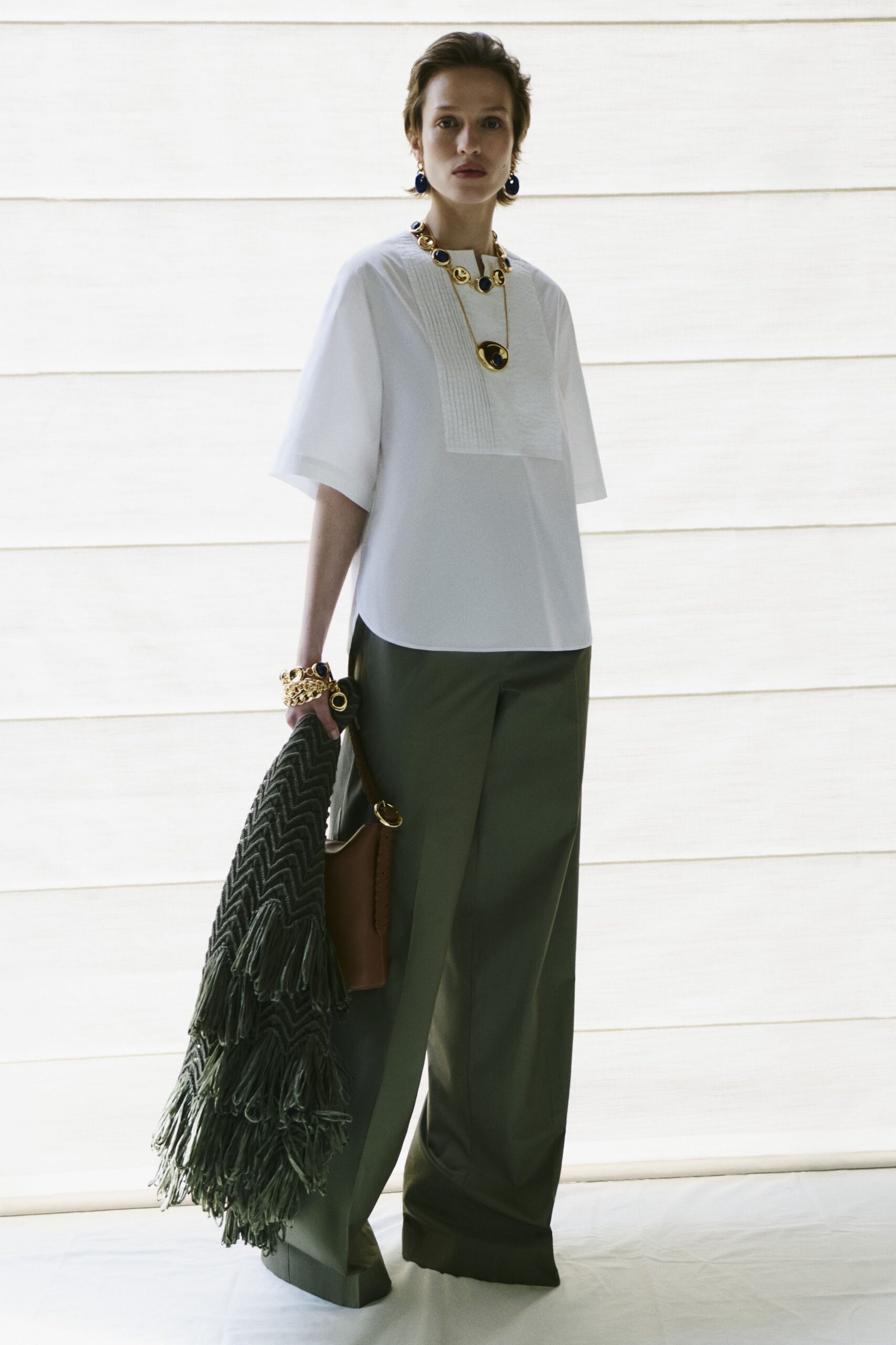white bib-front tunic top