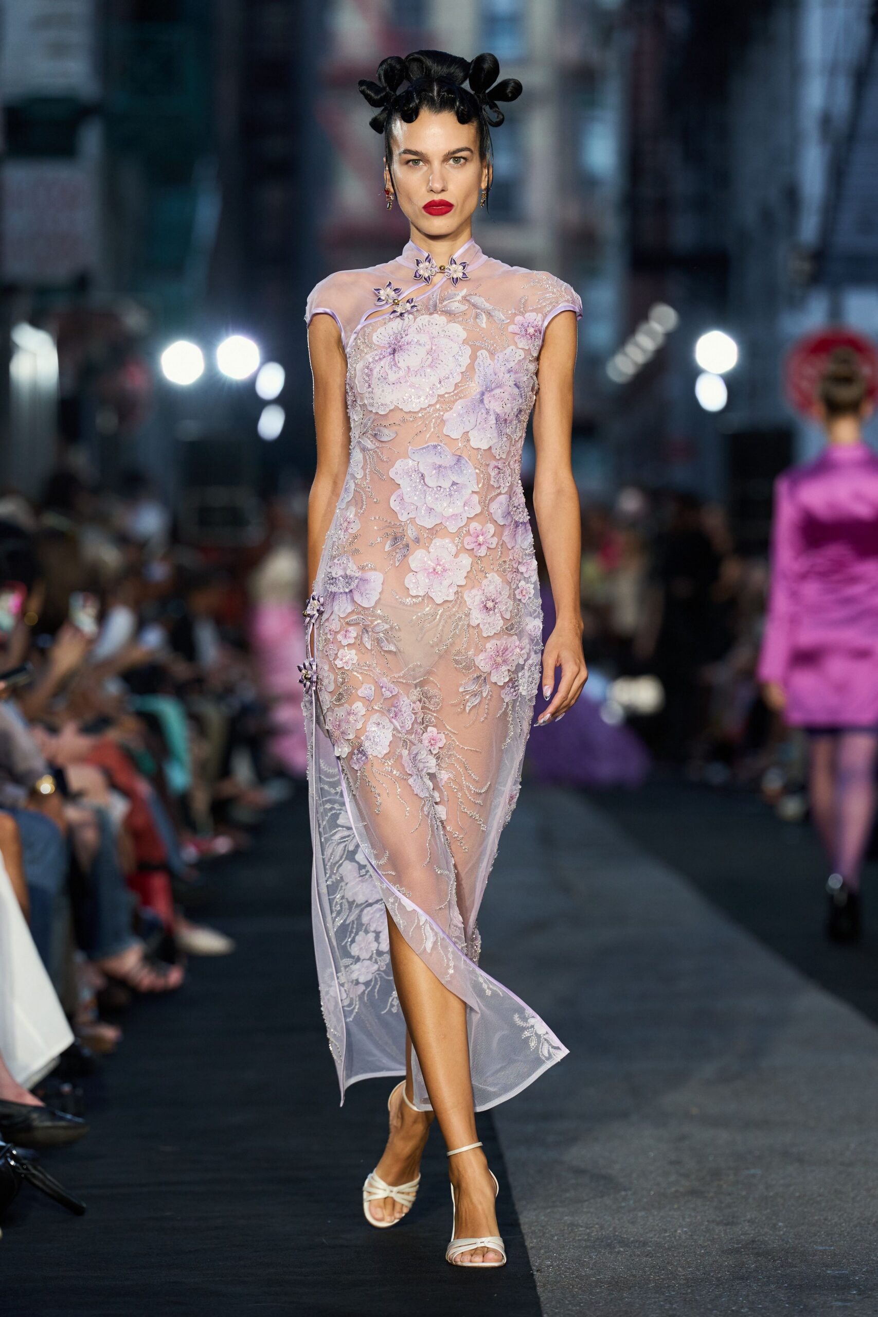 Sheer blush mesh qipao dress, strewn with lilac floral beadwork and frog closures. White leather sandals with narrow twisted straps. Crossing a hotel courtyard after a wedding, lanterns still burning.