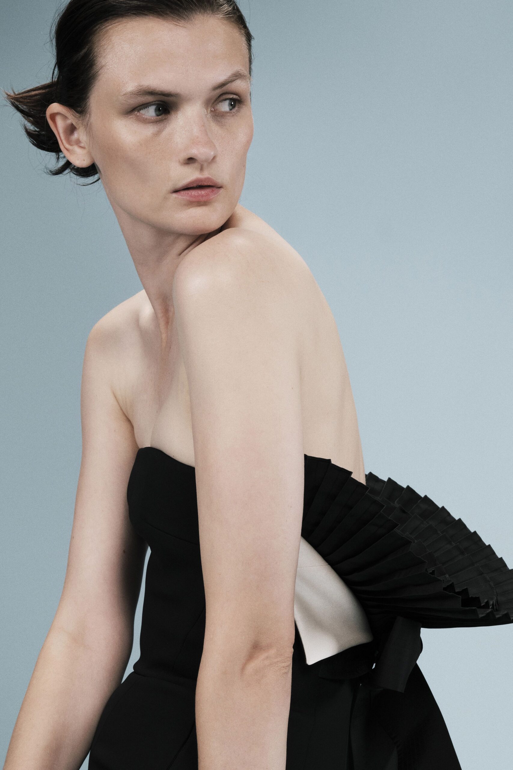 strapless dress with pleated back