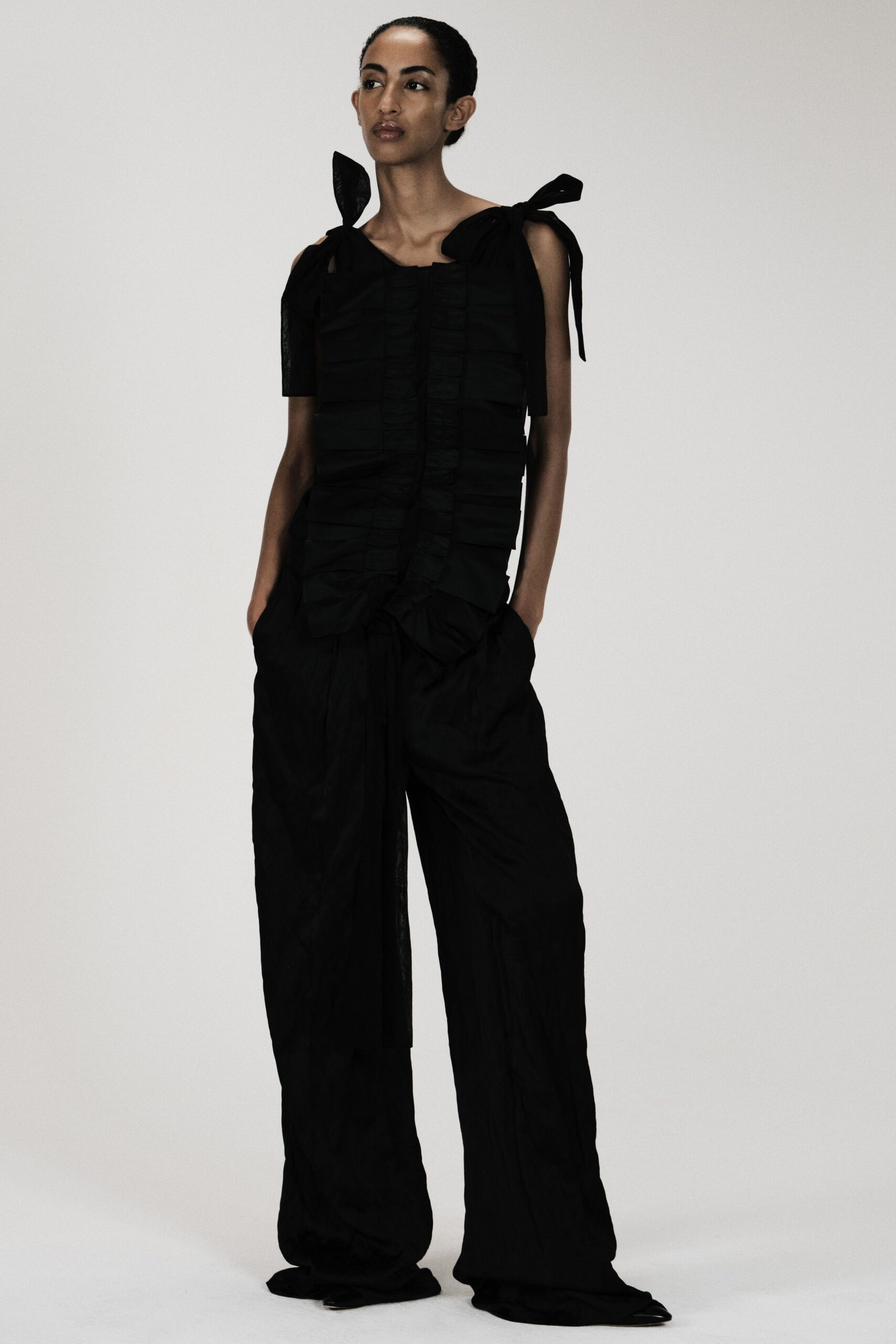 black shoulder-tie ruffled jumpsuit