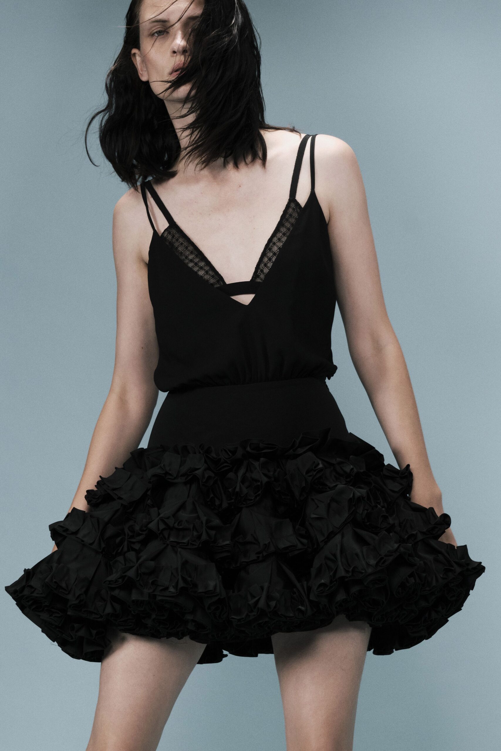 black ruffled bubble hem mini dress