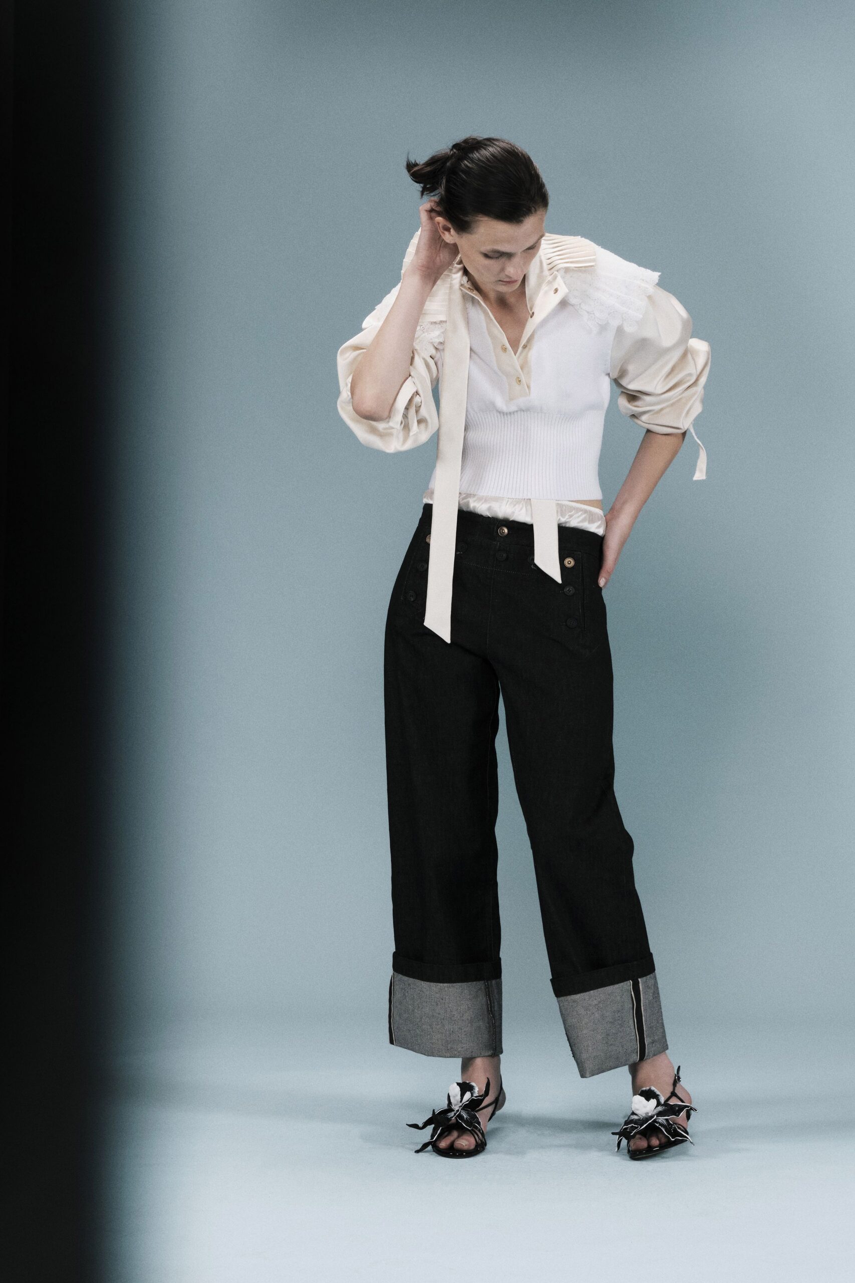 ruffled ivory bib-front blouse