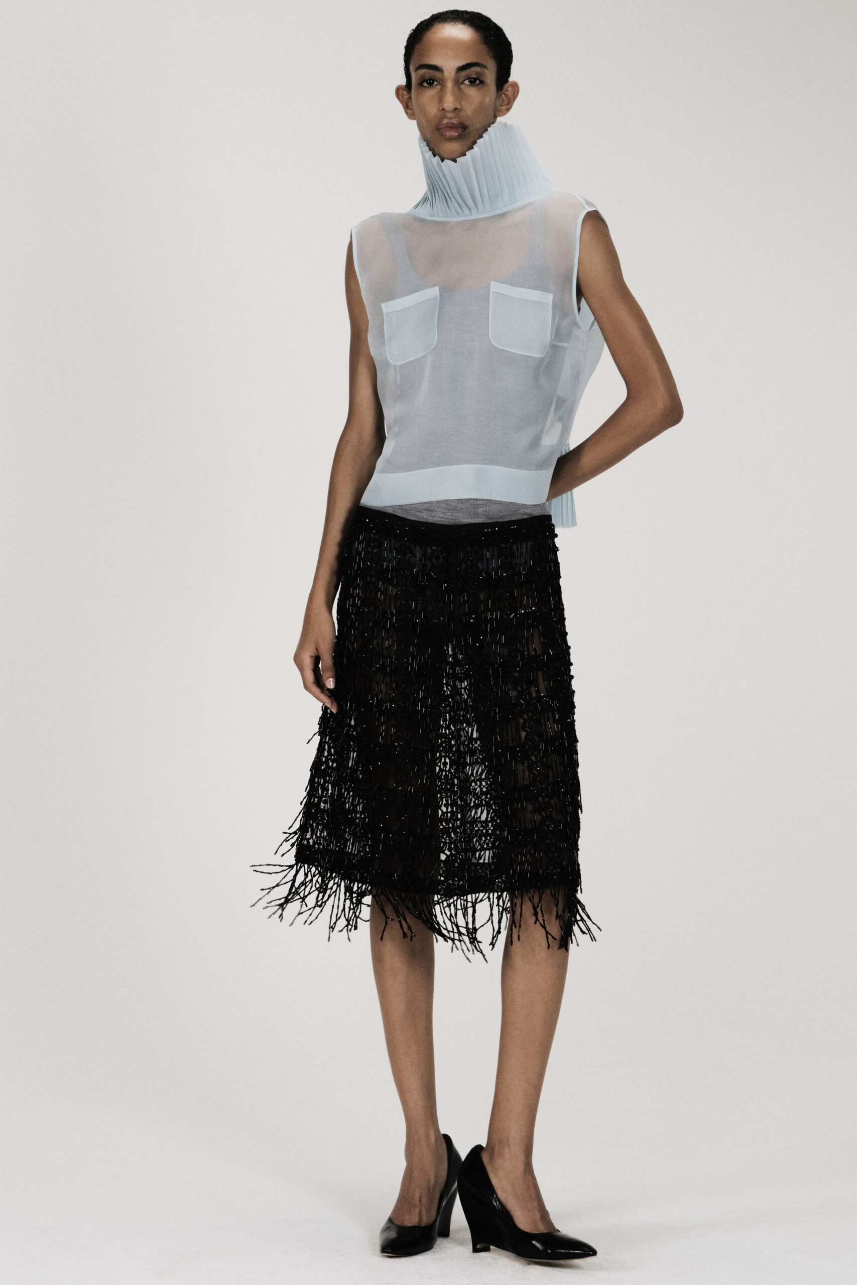 white organza sleeveless high-neck pleated pockets top