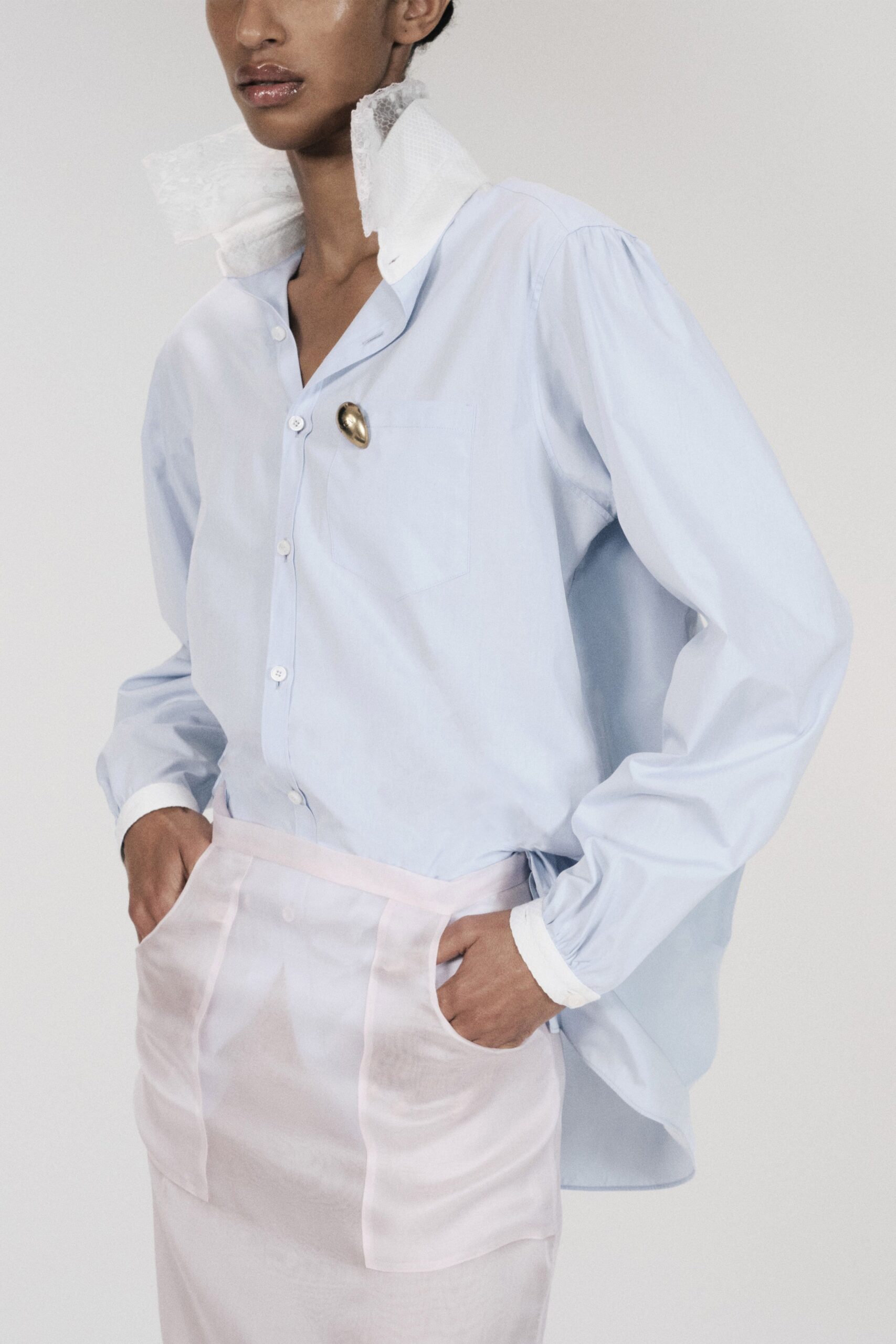 ruff-collar blue button-down shirt