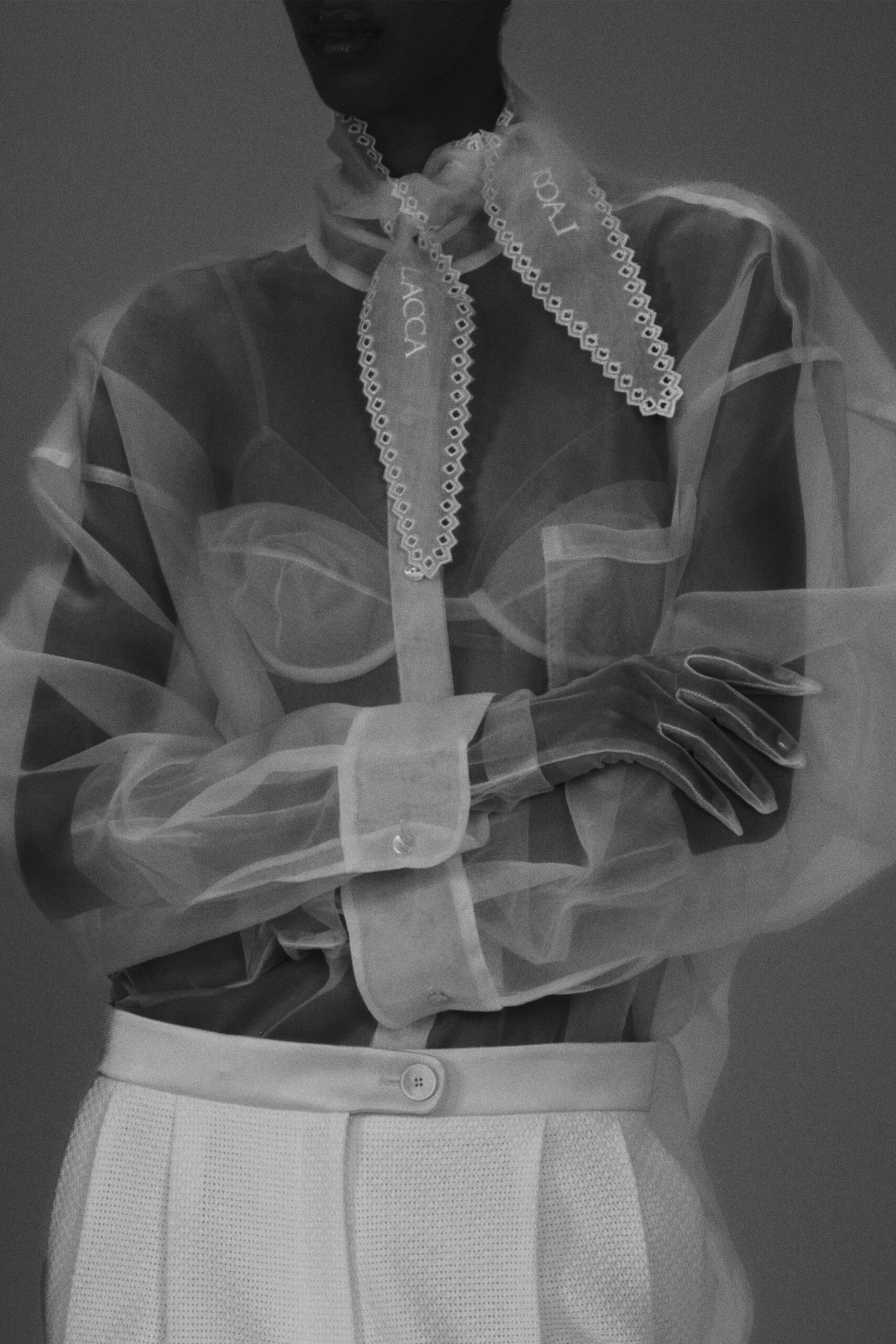 white organza long-sleeve collared buttoned sheer flowing blouse