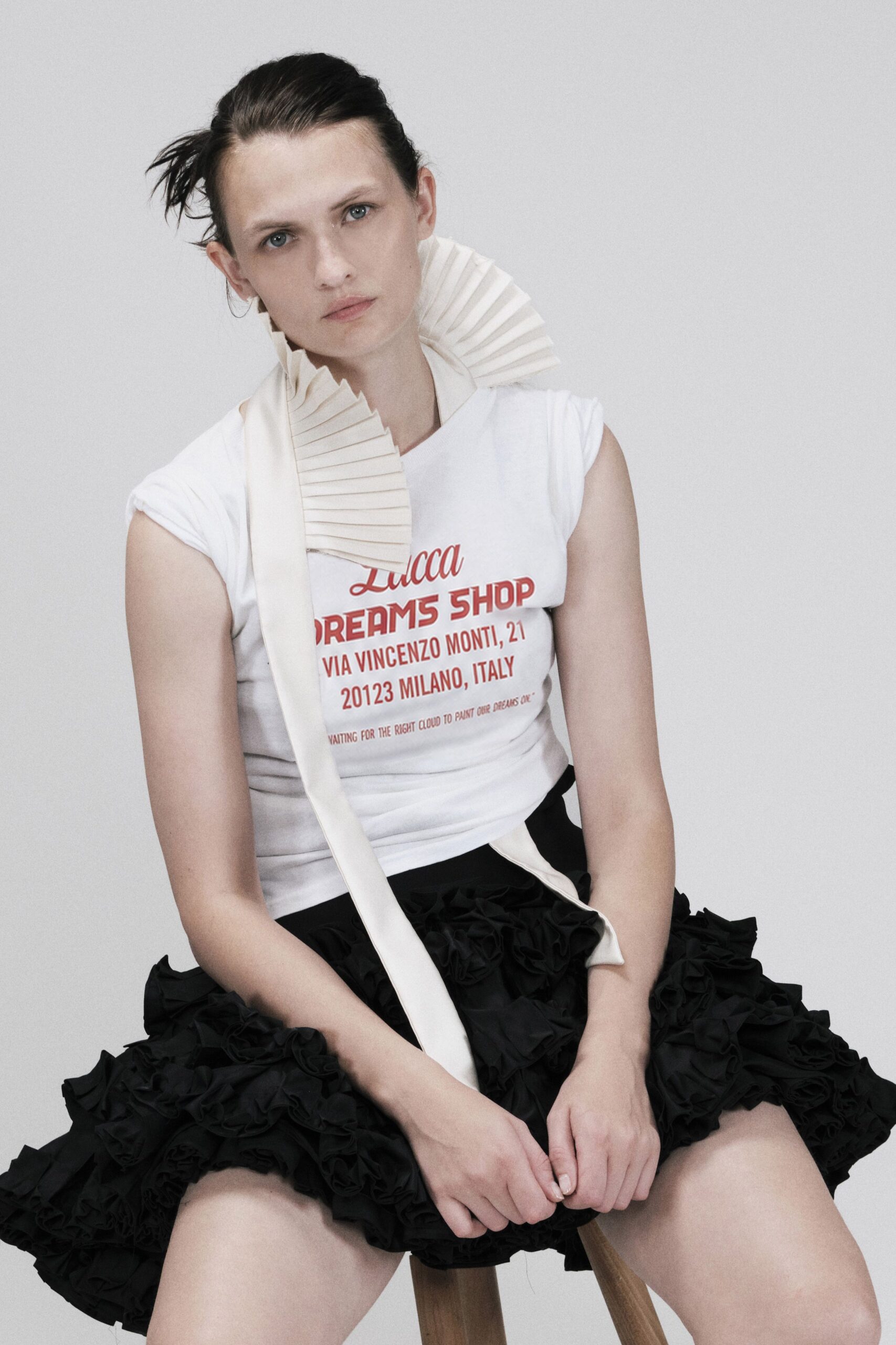 white slogan top with pleated ruff