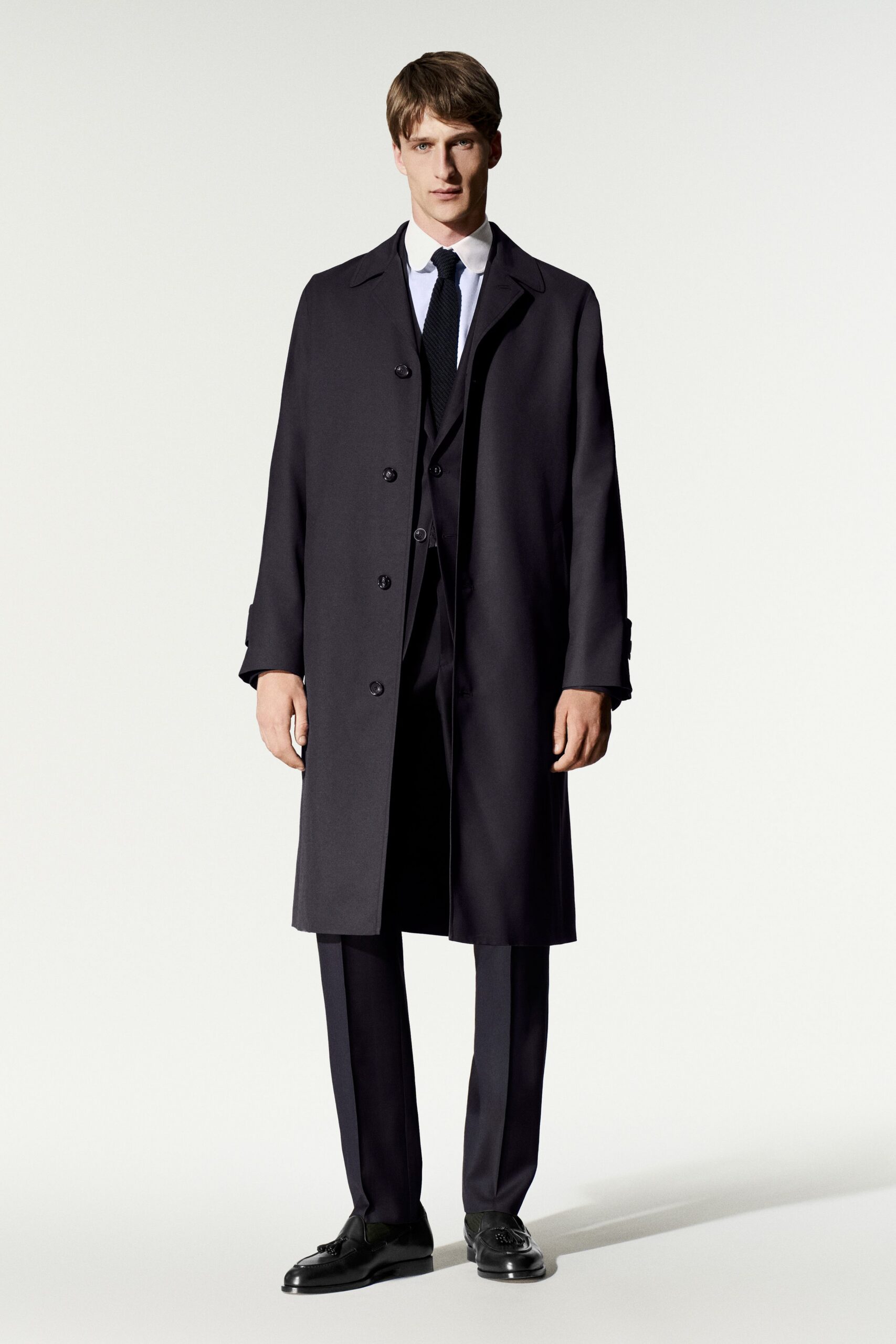 black single-breasted topcoat