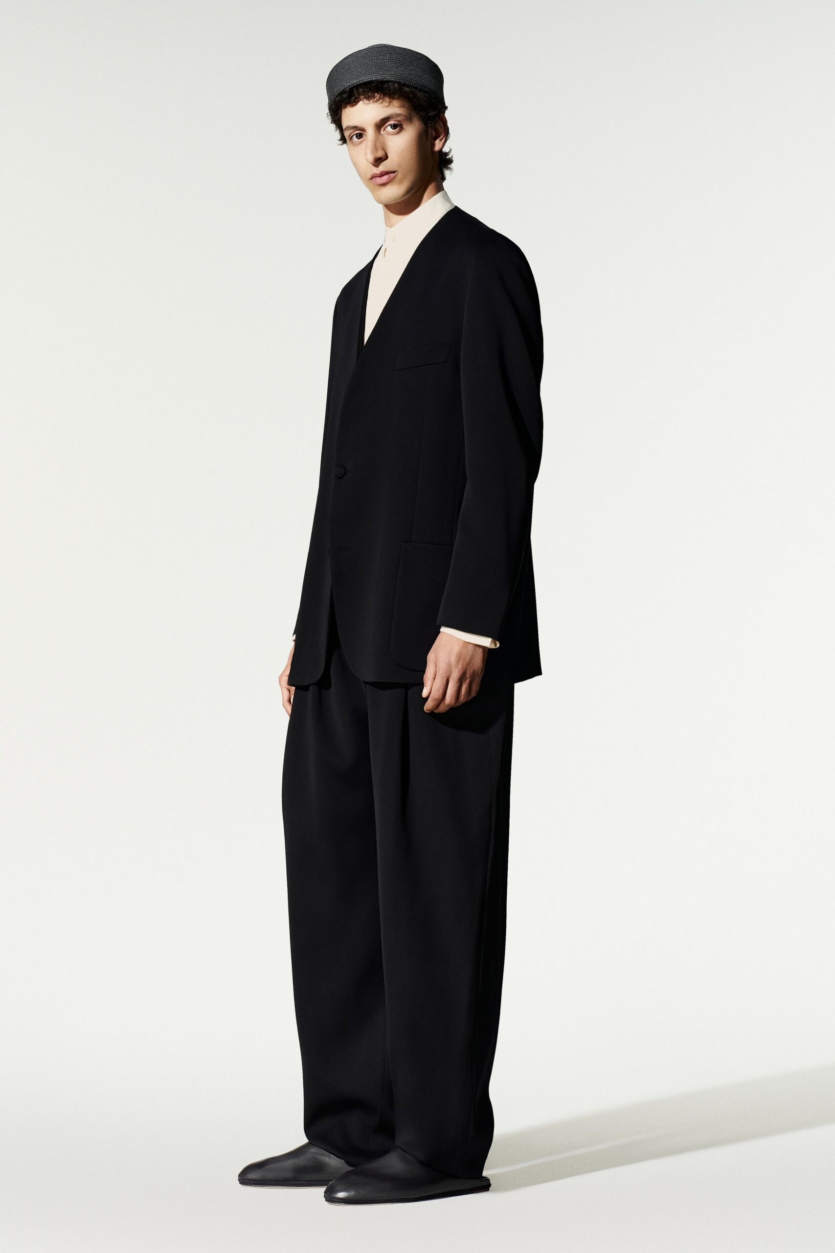 collarless black tailored jacket