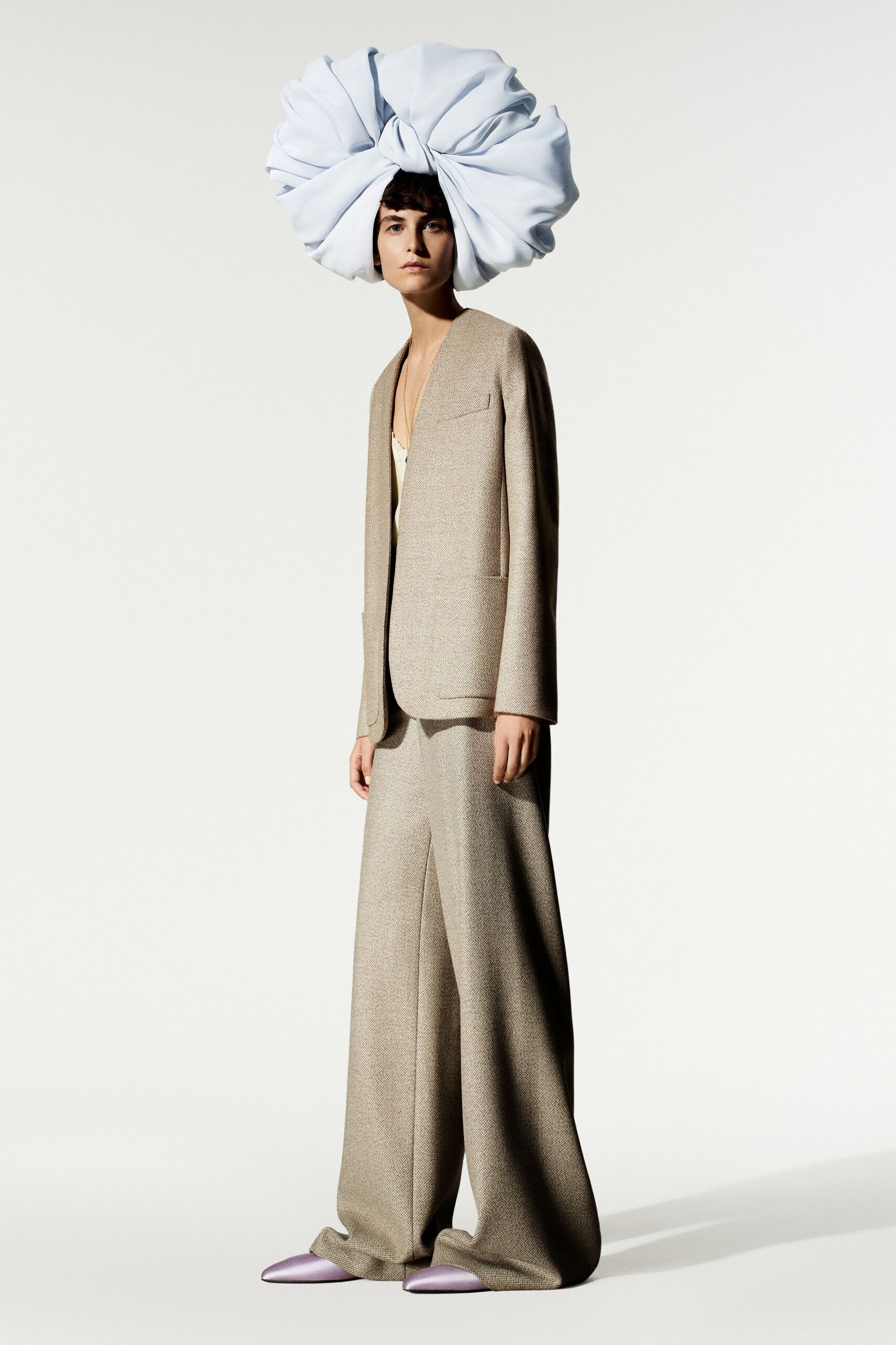 ivory satin spaghetti-strap low-cut shiny top