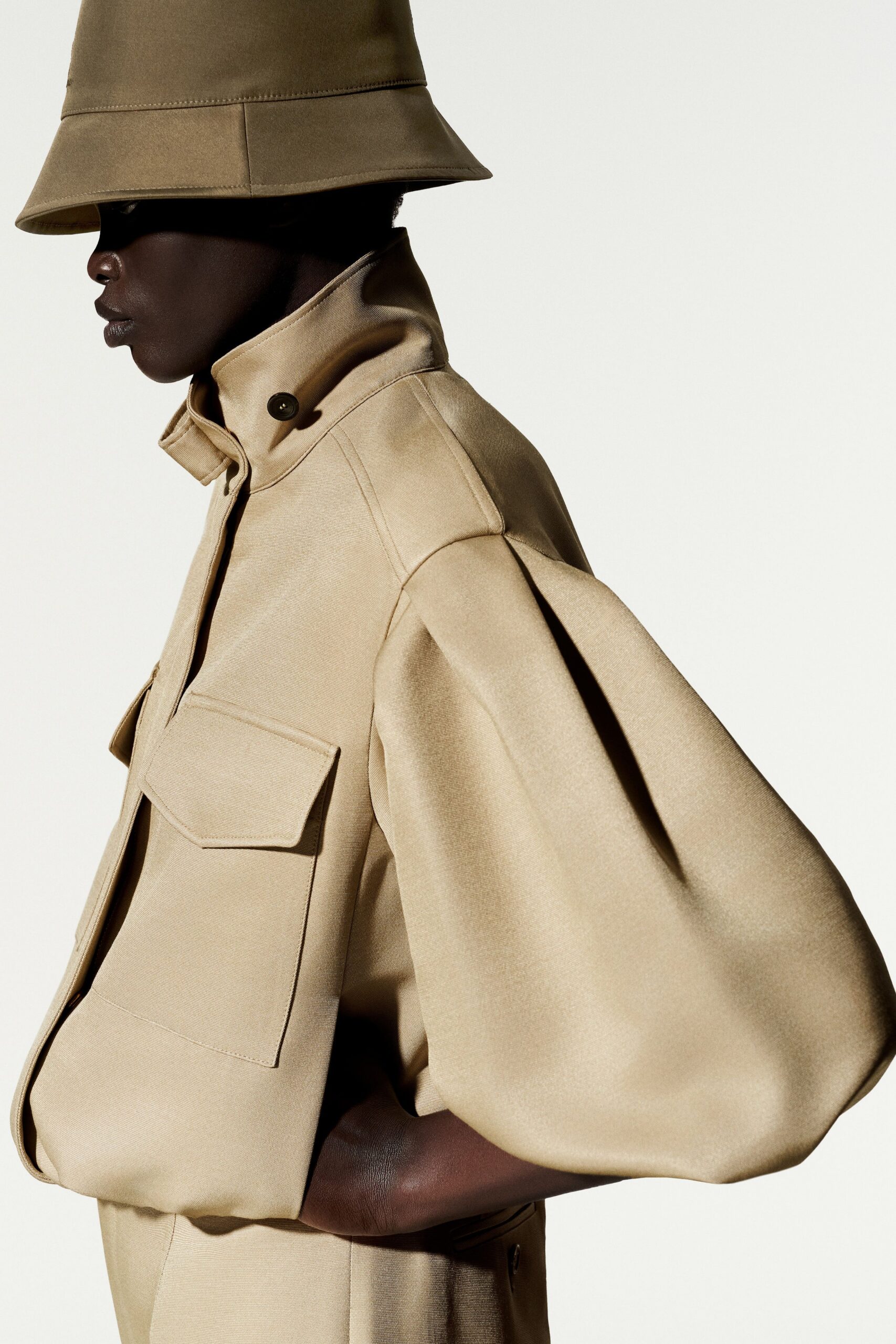 oversized beige cape-sleeve jacket