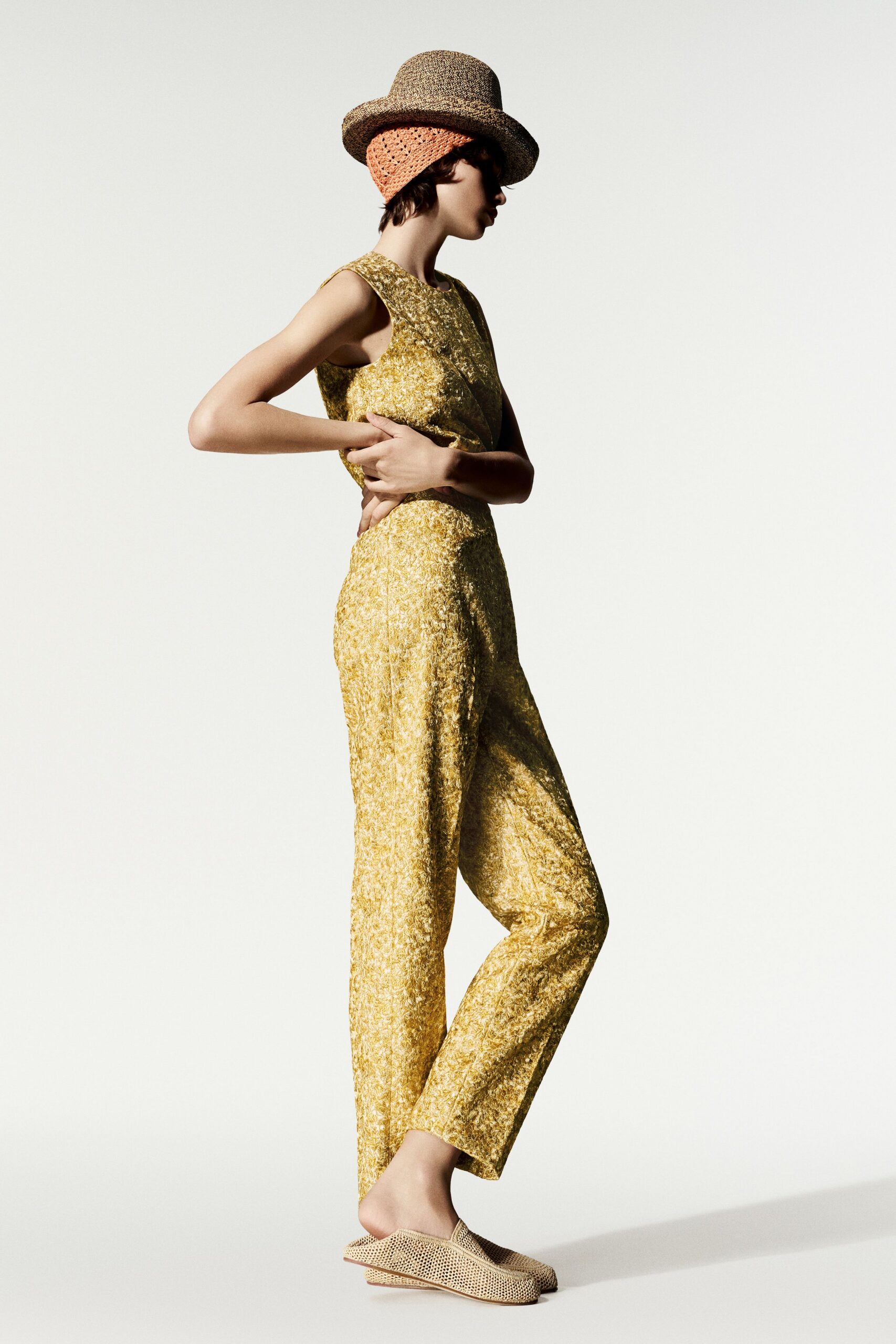 textured yellow sleeveless jumpsuit