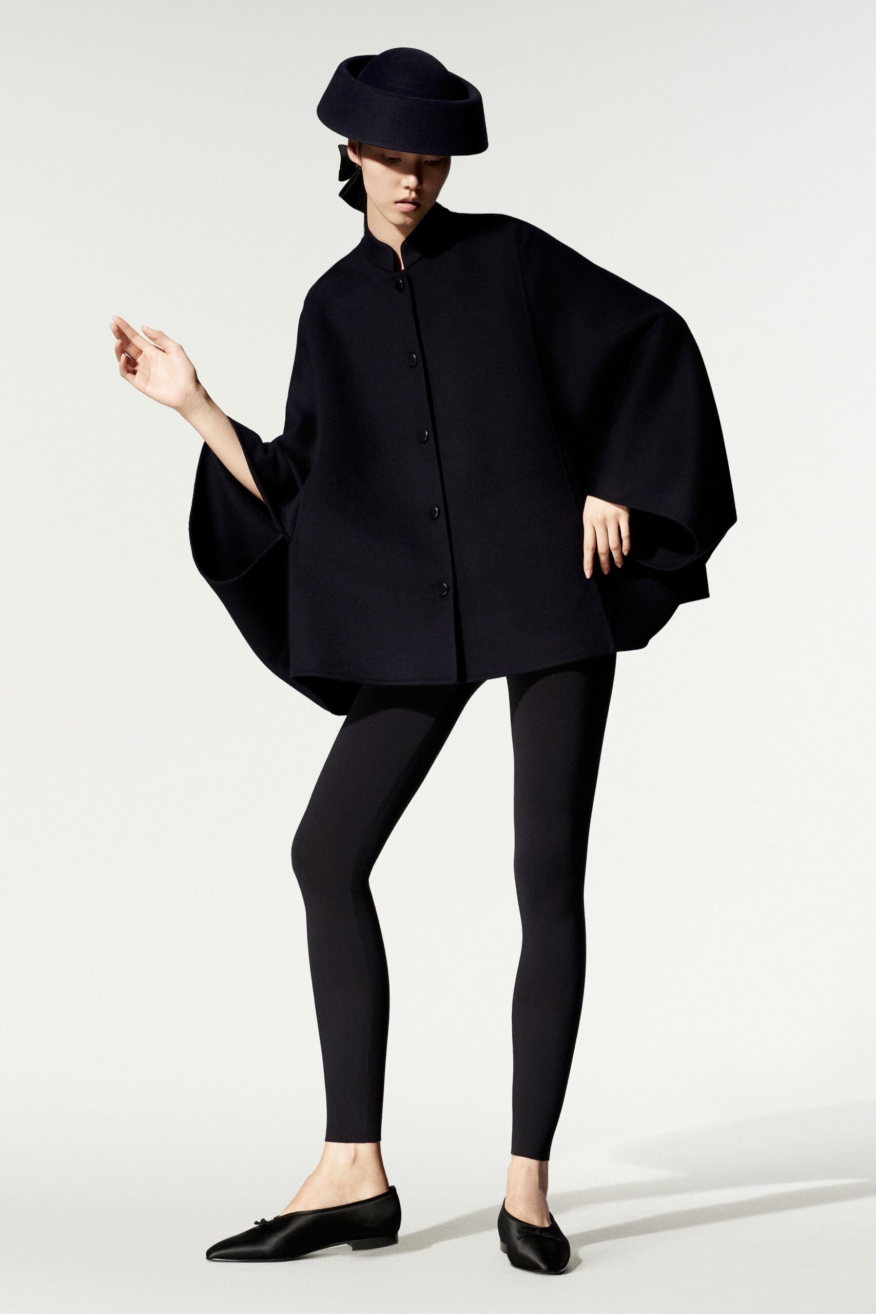 black sculptural cape jacket