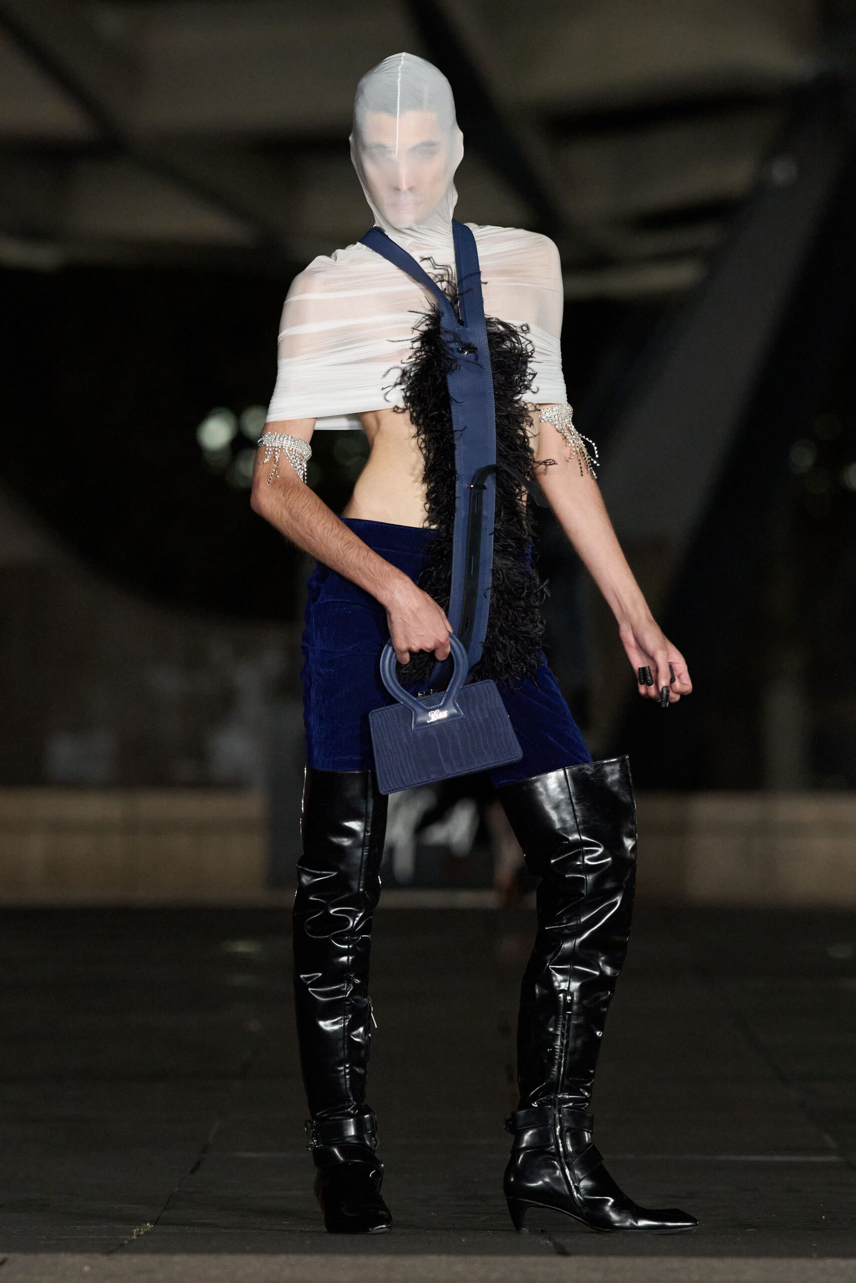black leather thigh-high pointed-toe shiny boots