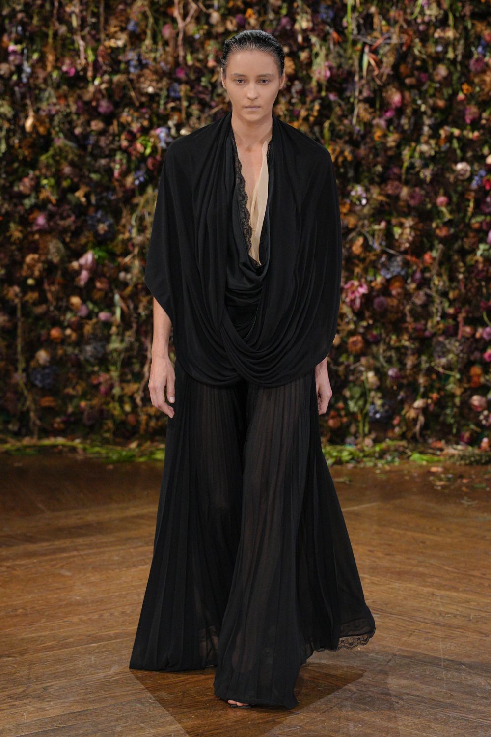 black draped sheer evening gown