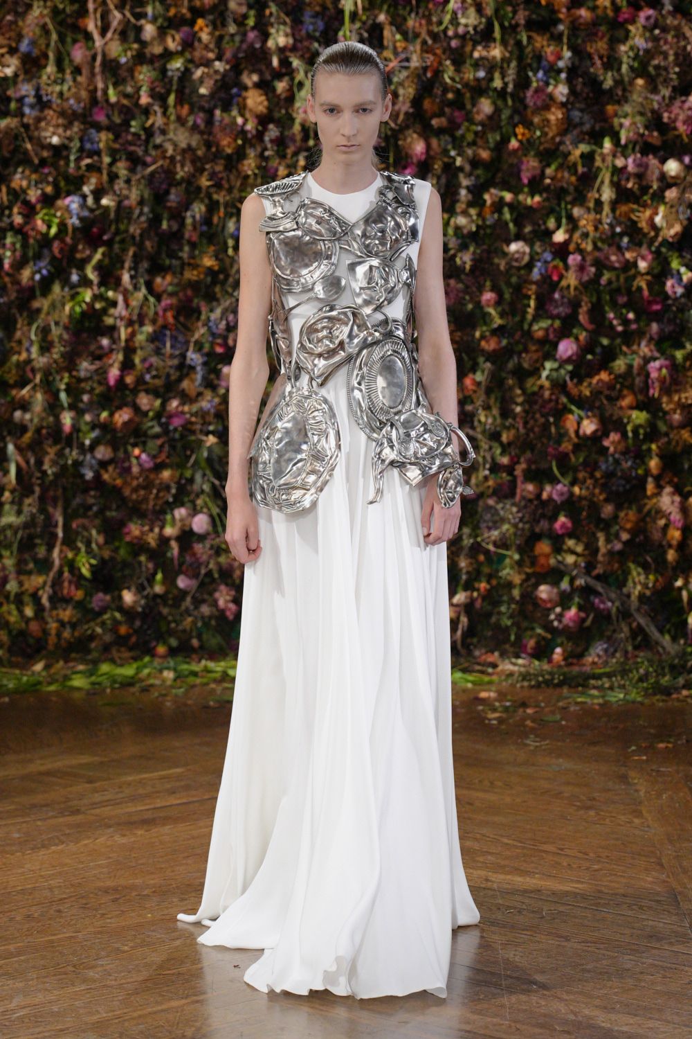 white chiffon gown with metallic armor bodice