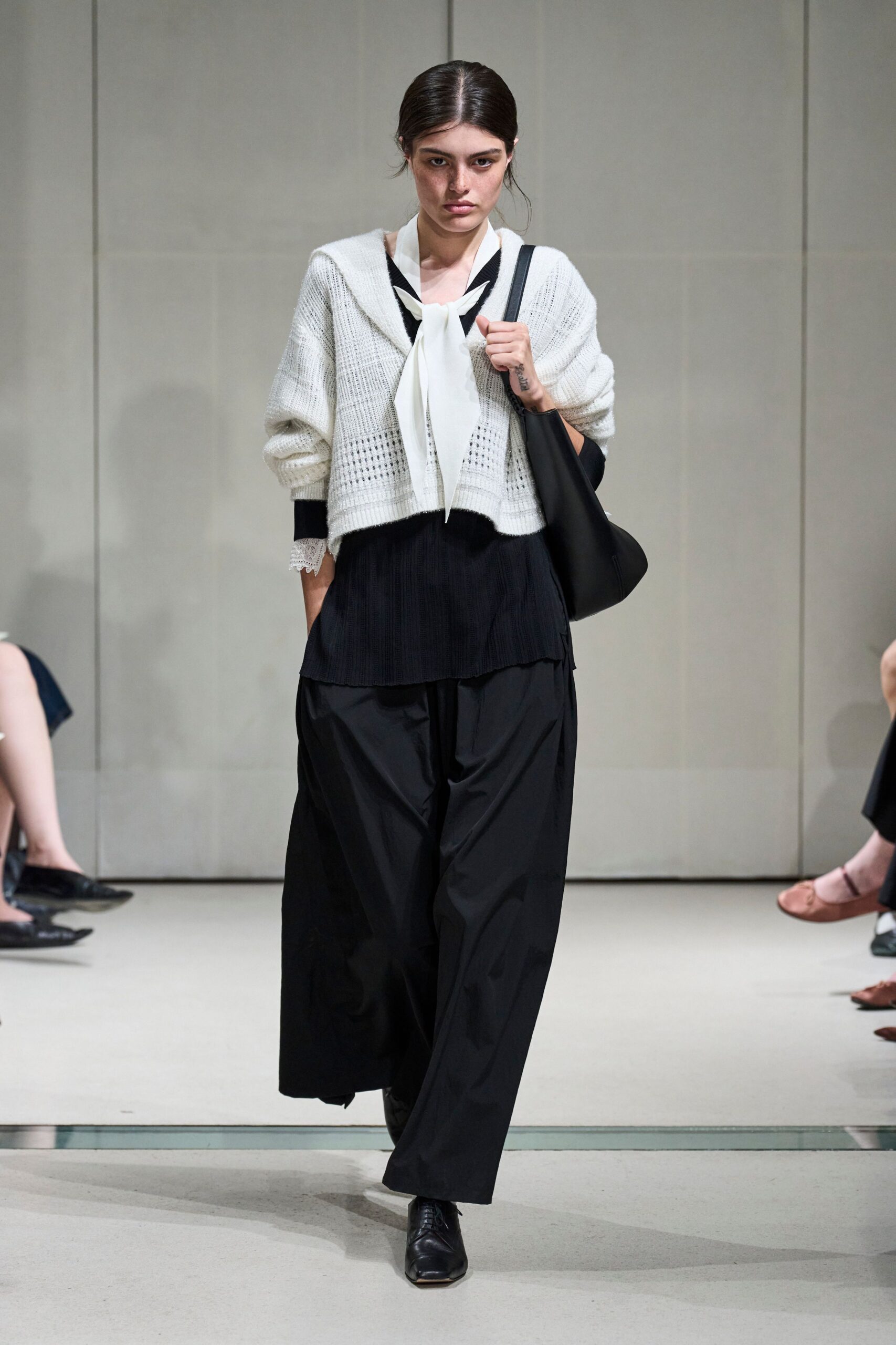 white tie-neck cardigan layered look