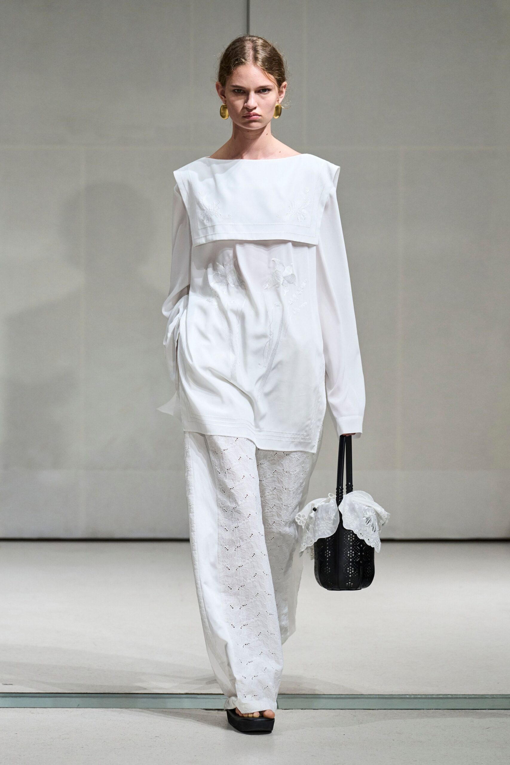 white bib-front embroidered blouse