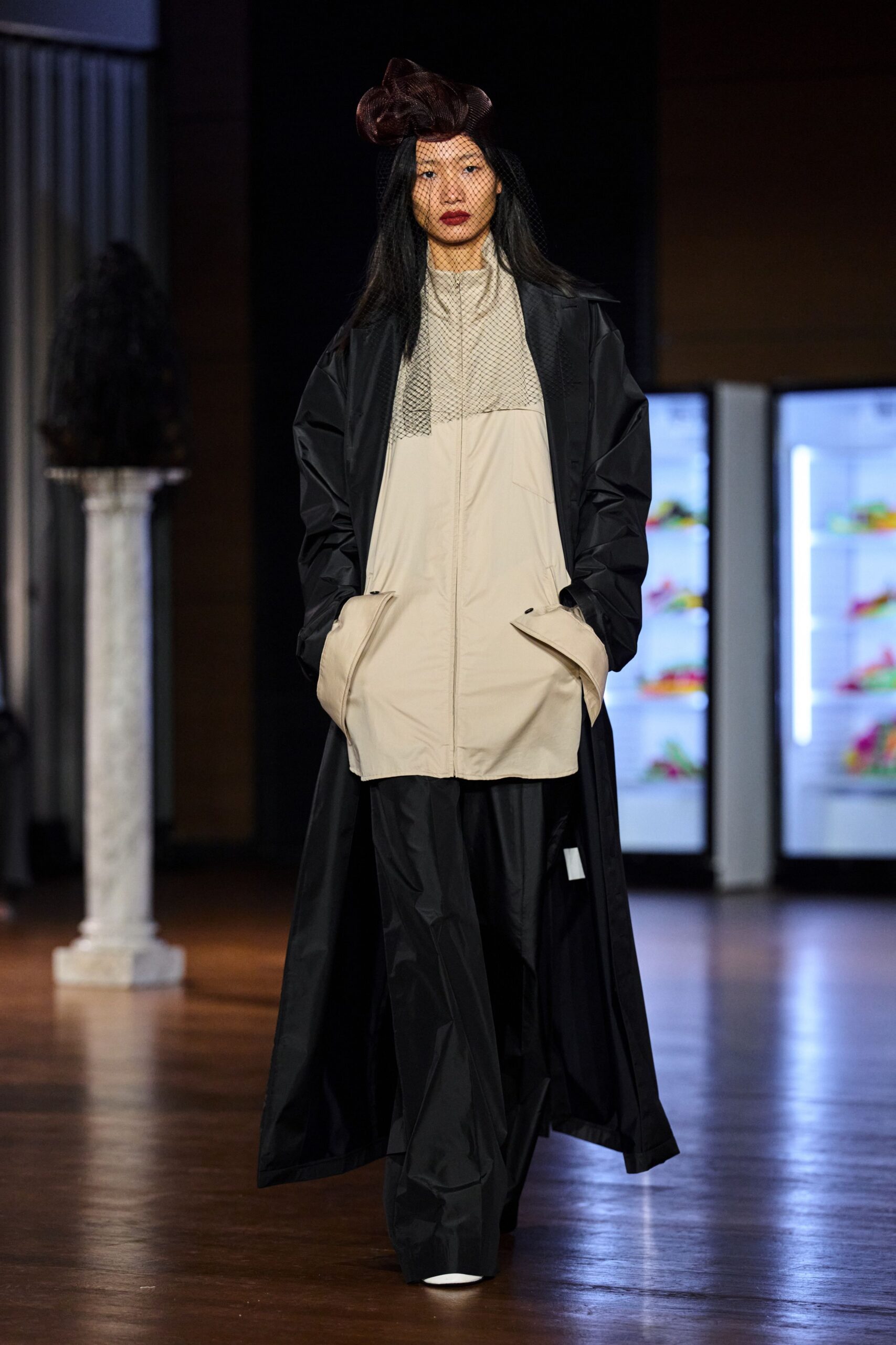 black maxi overcoat with ivory utility dress