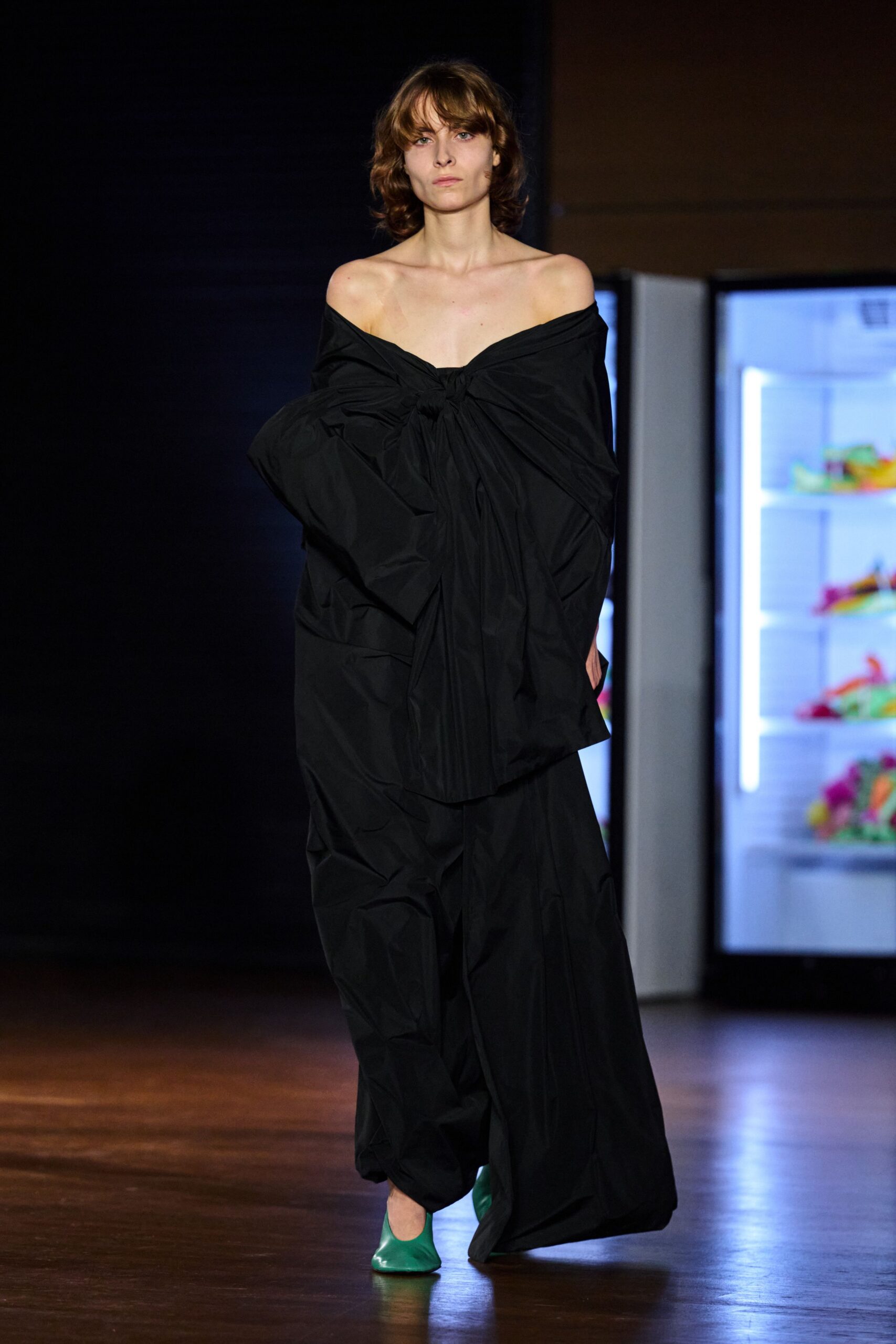 black off-shoulder draped evening gown