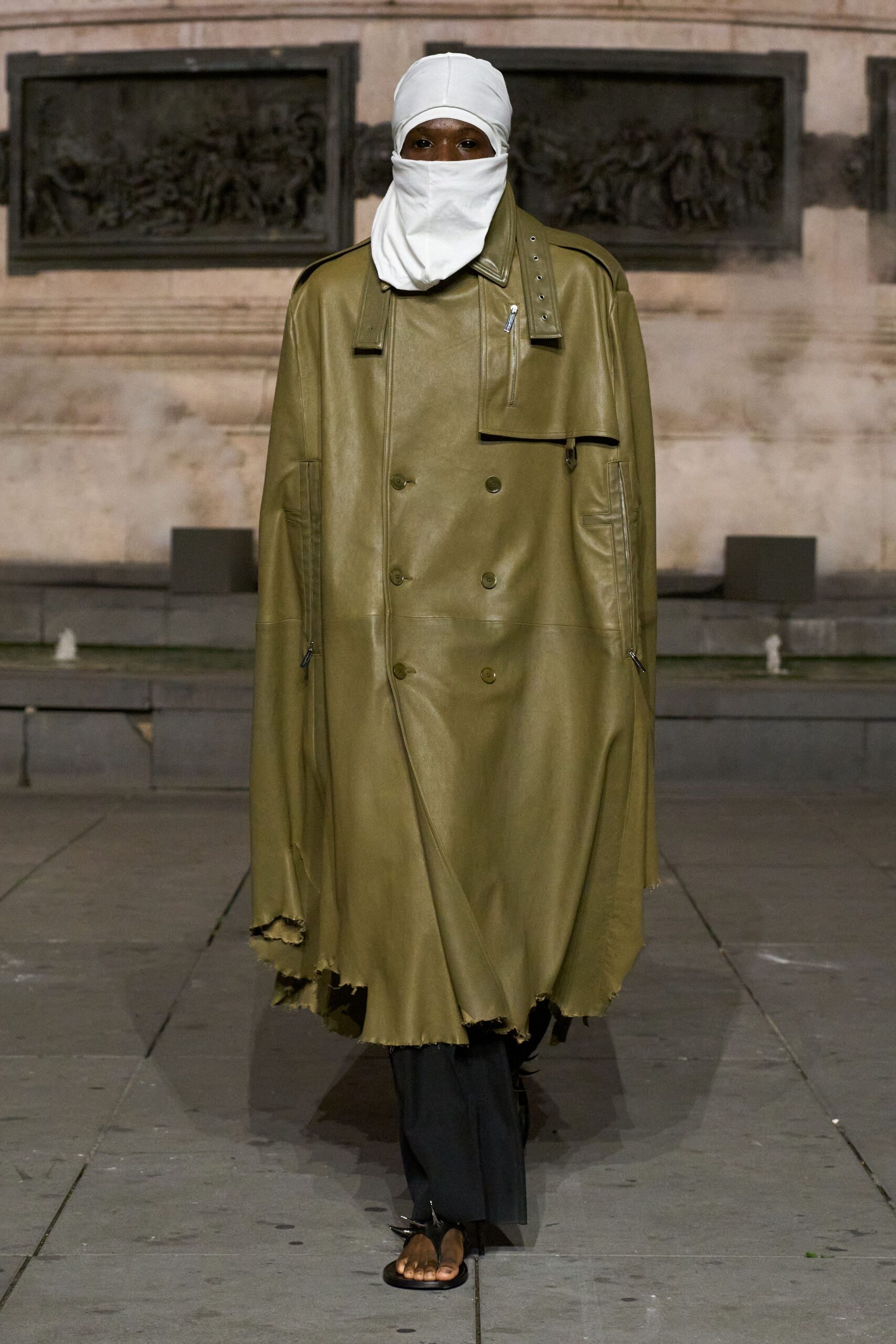 green leather long-sleeve collared oversized buttoned zippered coat