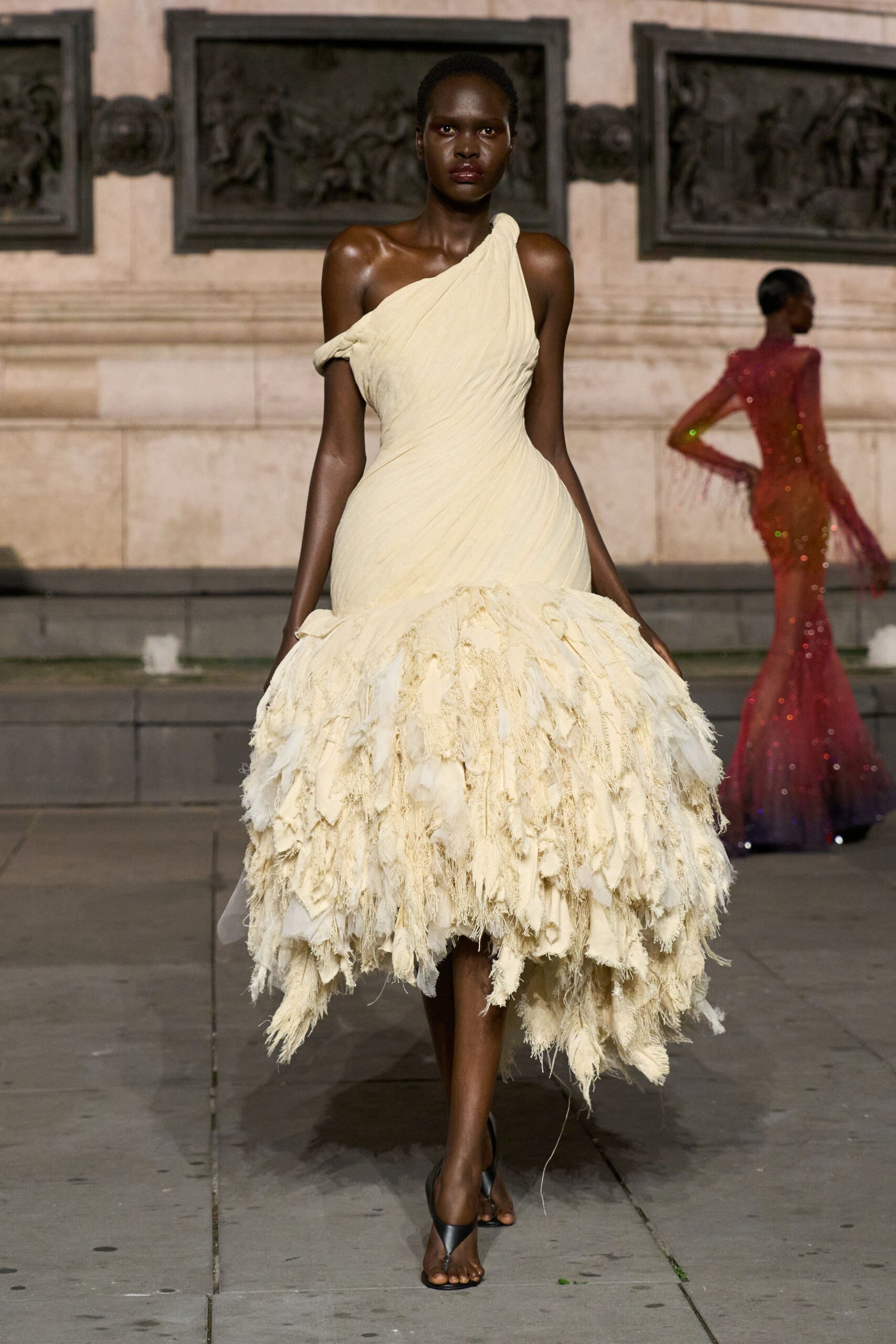 ivory tulle asymmetric off-shoulder fitted pleated feathered gown