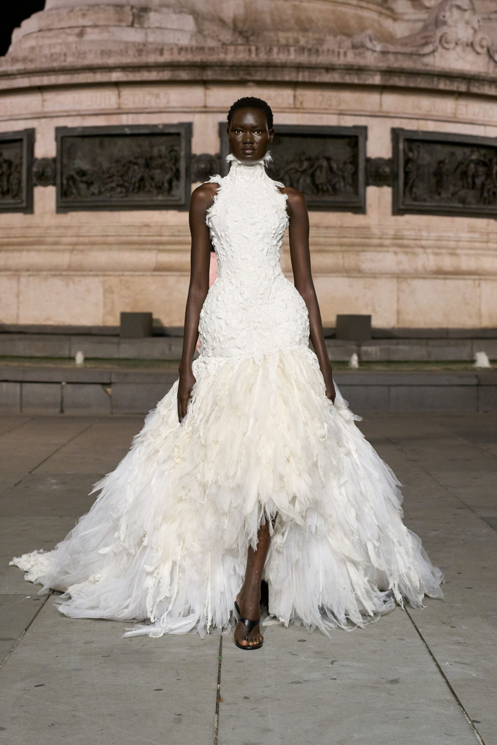 ivory tulle sleeveless high-neck fitted feathered ruffled gown