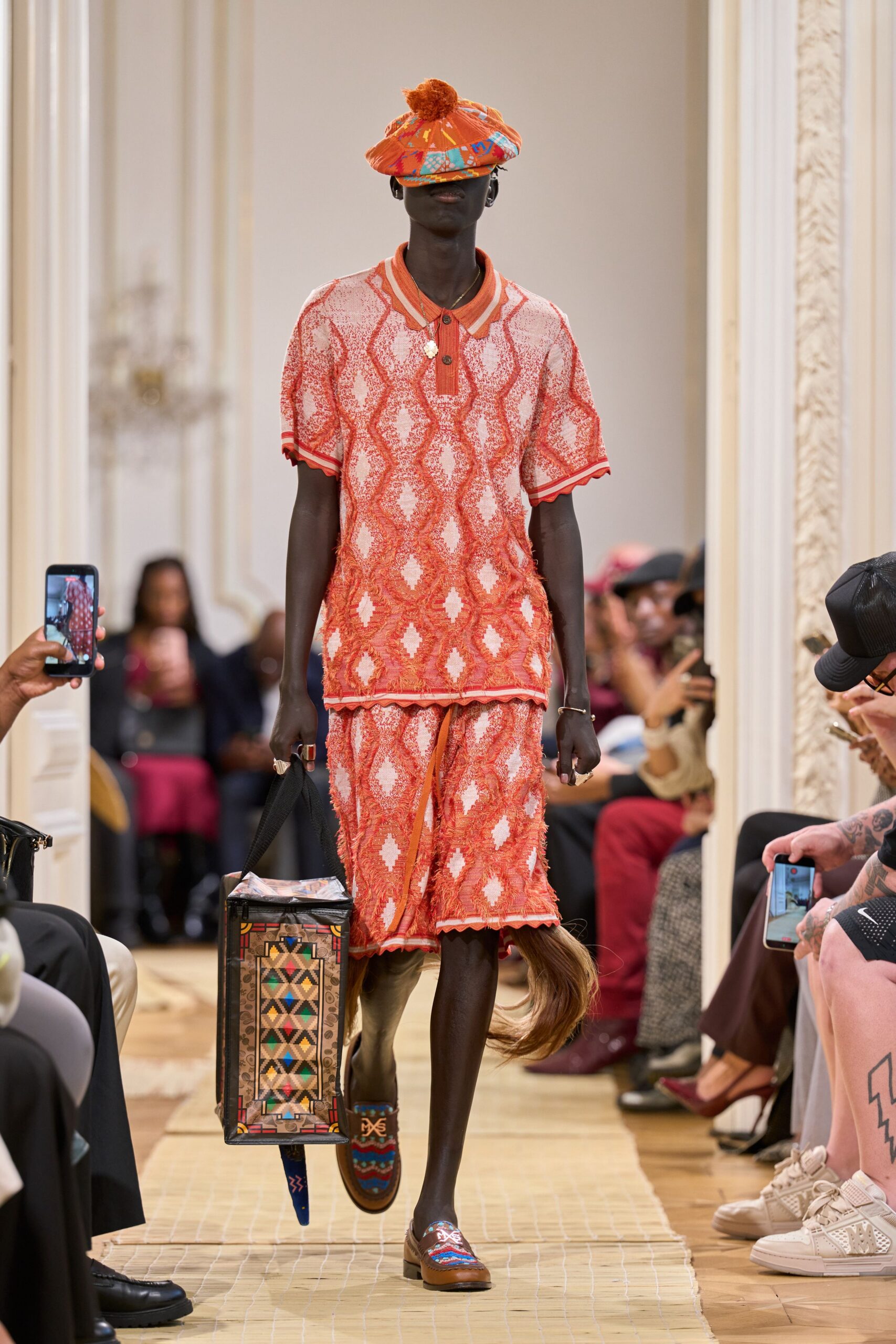 orange patterned knit polo shirt